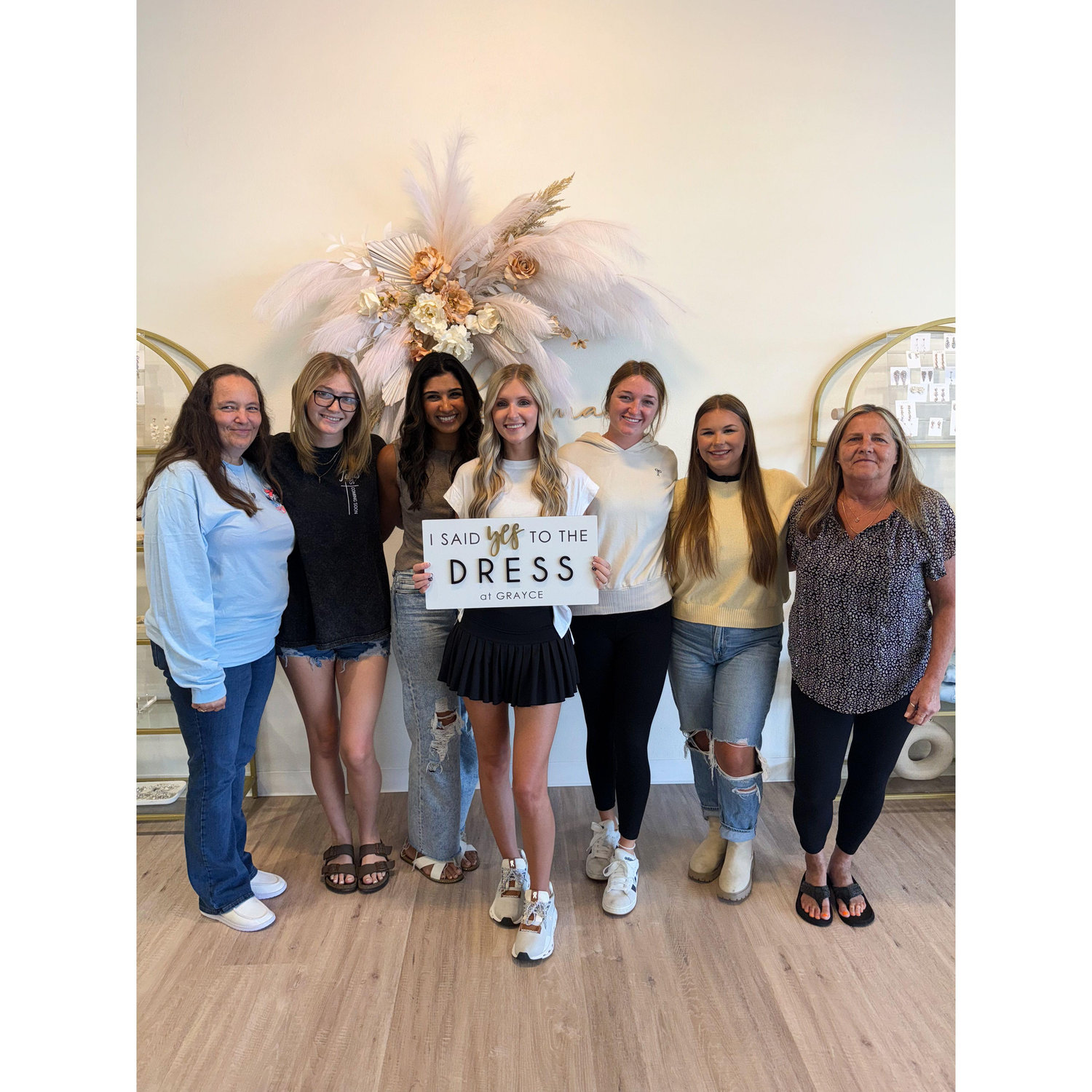 Chelsey & her bridal party after she found THE dress