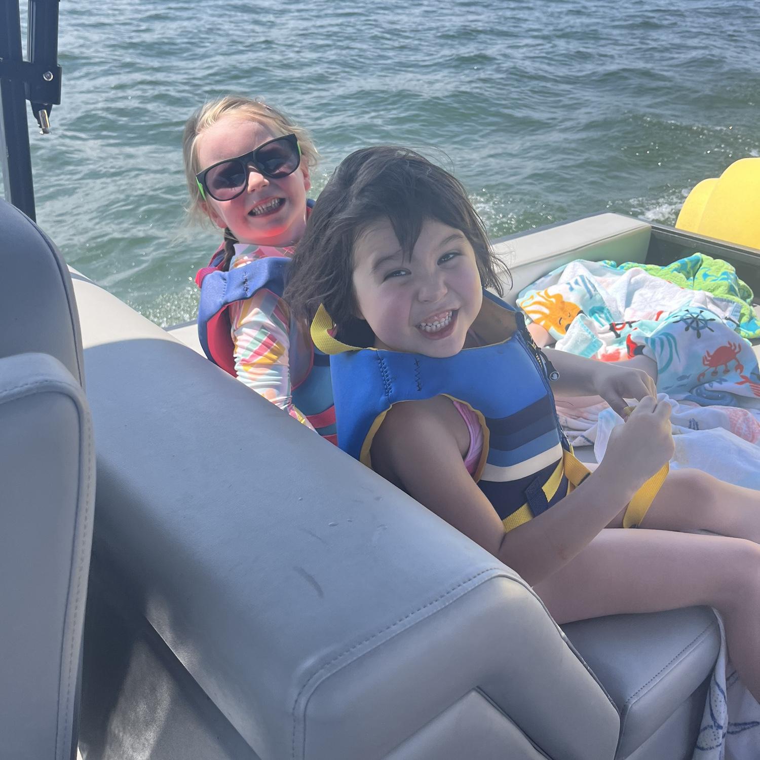 Amelia and Teddy boating with us.