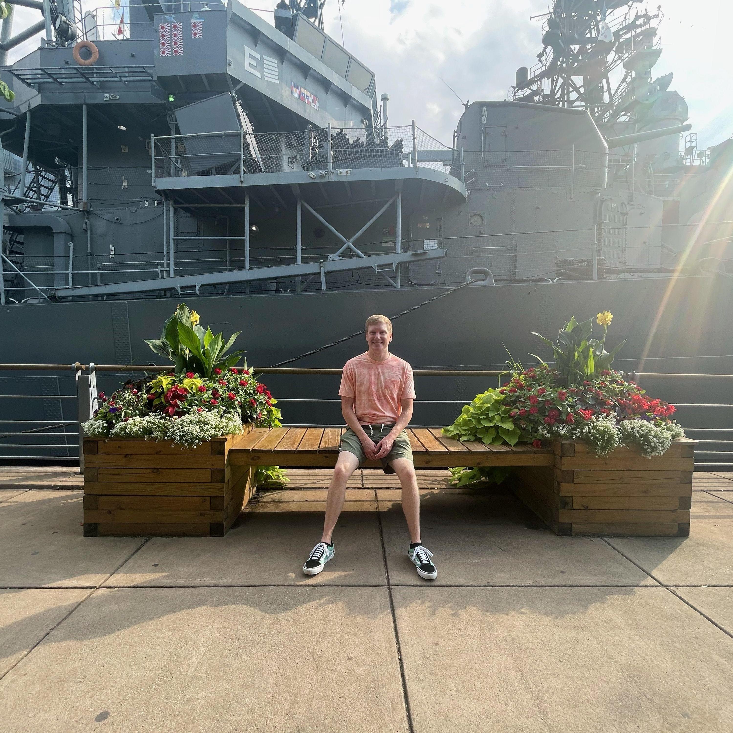 Tim by the Naval ships downtown
