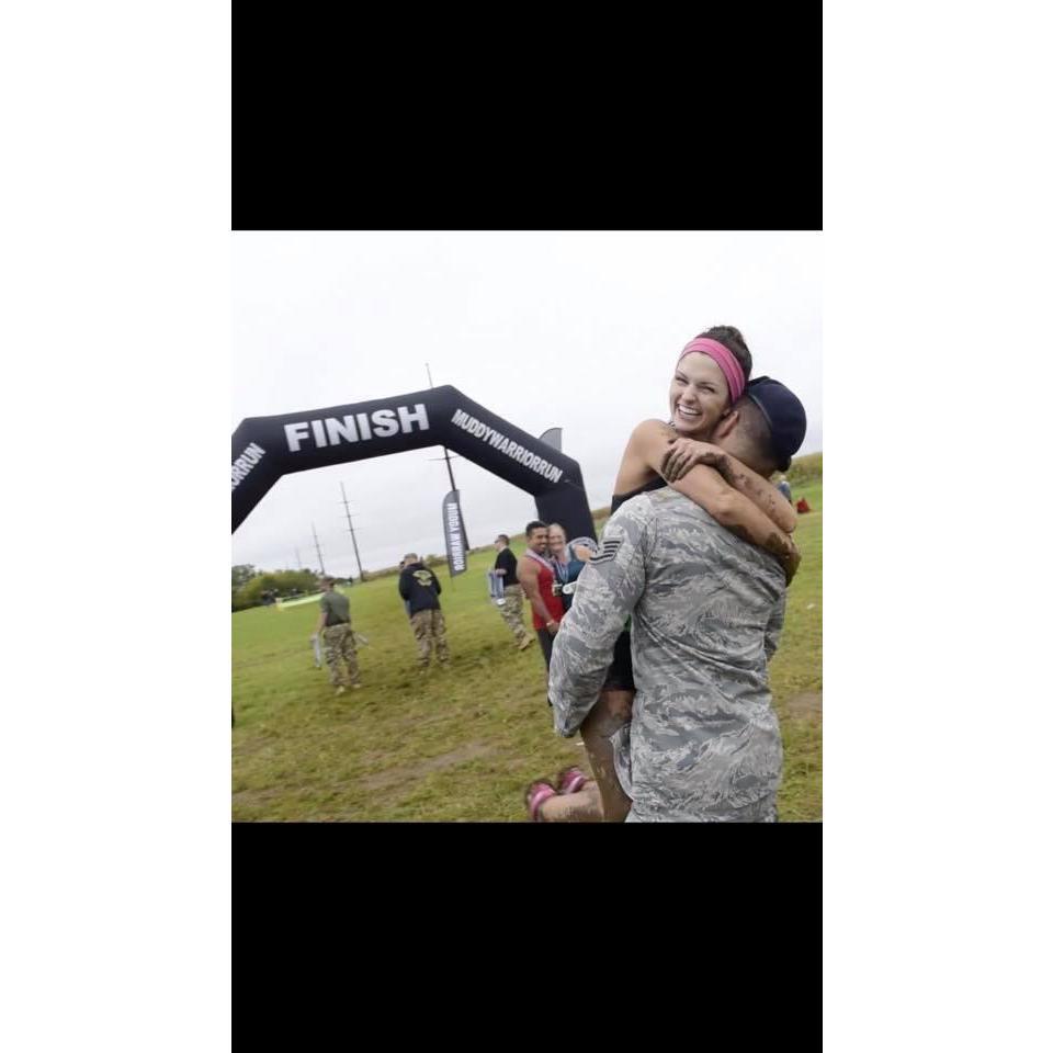 Korinne crossing finish line @ Muddy Warrior Run