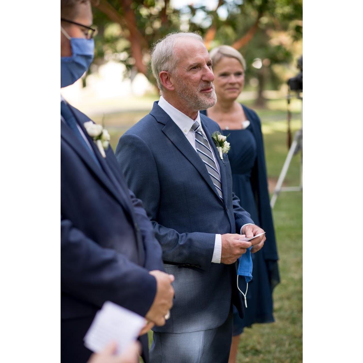 Steve's father, Todd, reading one of the seven blessings, mid ceremony