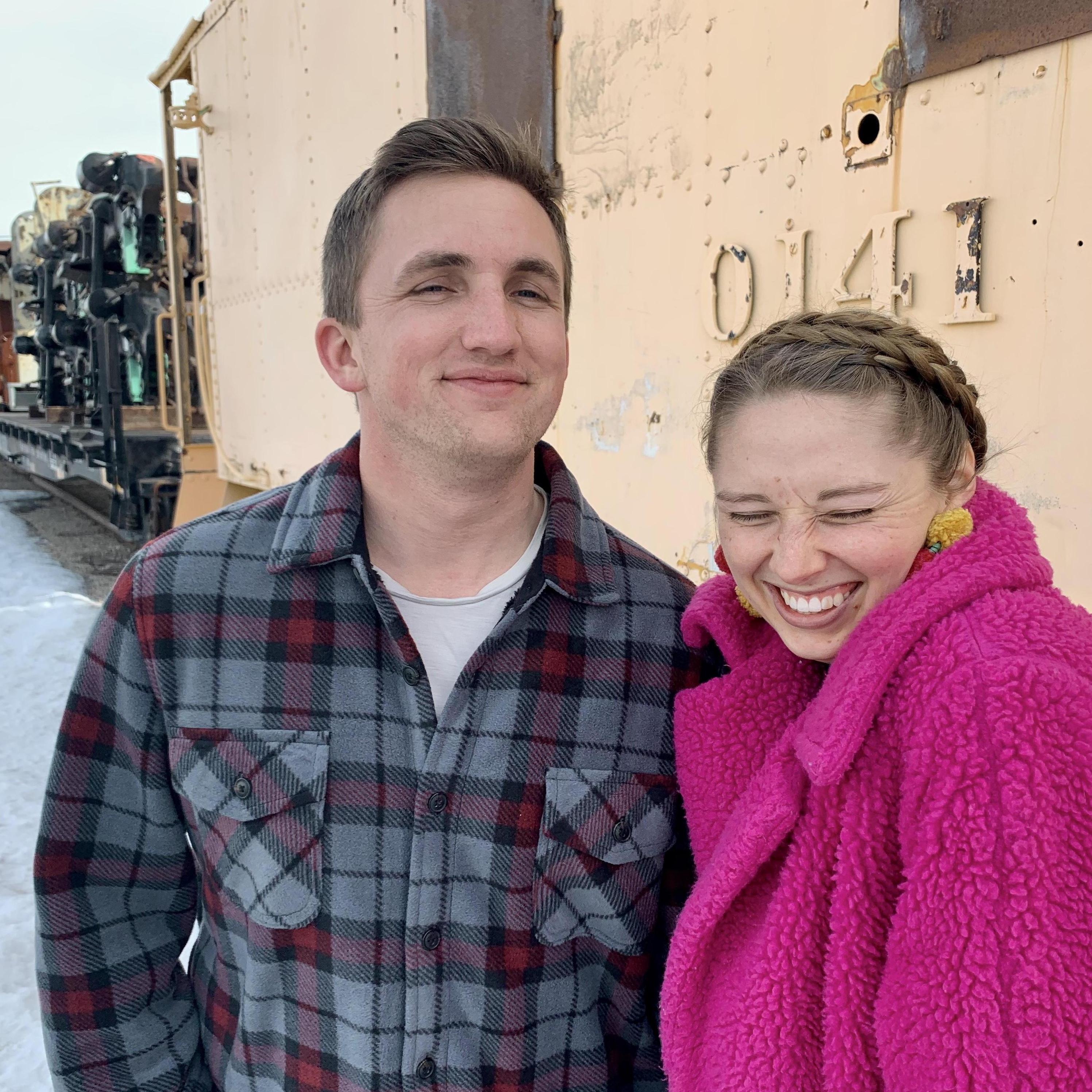 "Let's take a picture by this cool train."