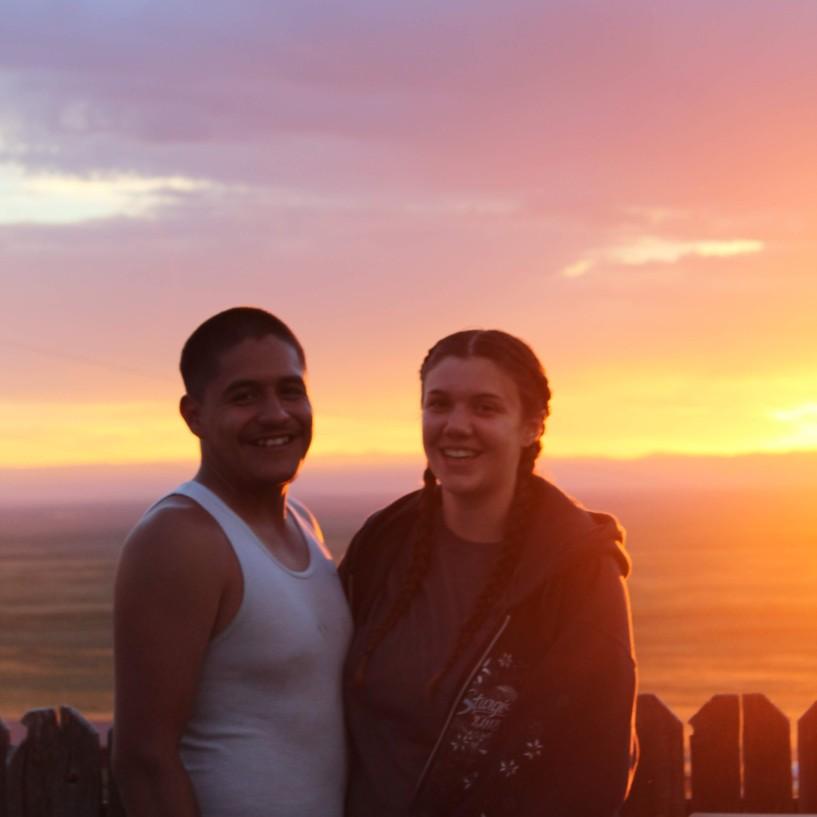 On our vacation to the sand dunes, enjoying the sunset.