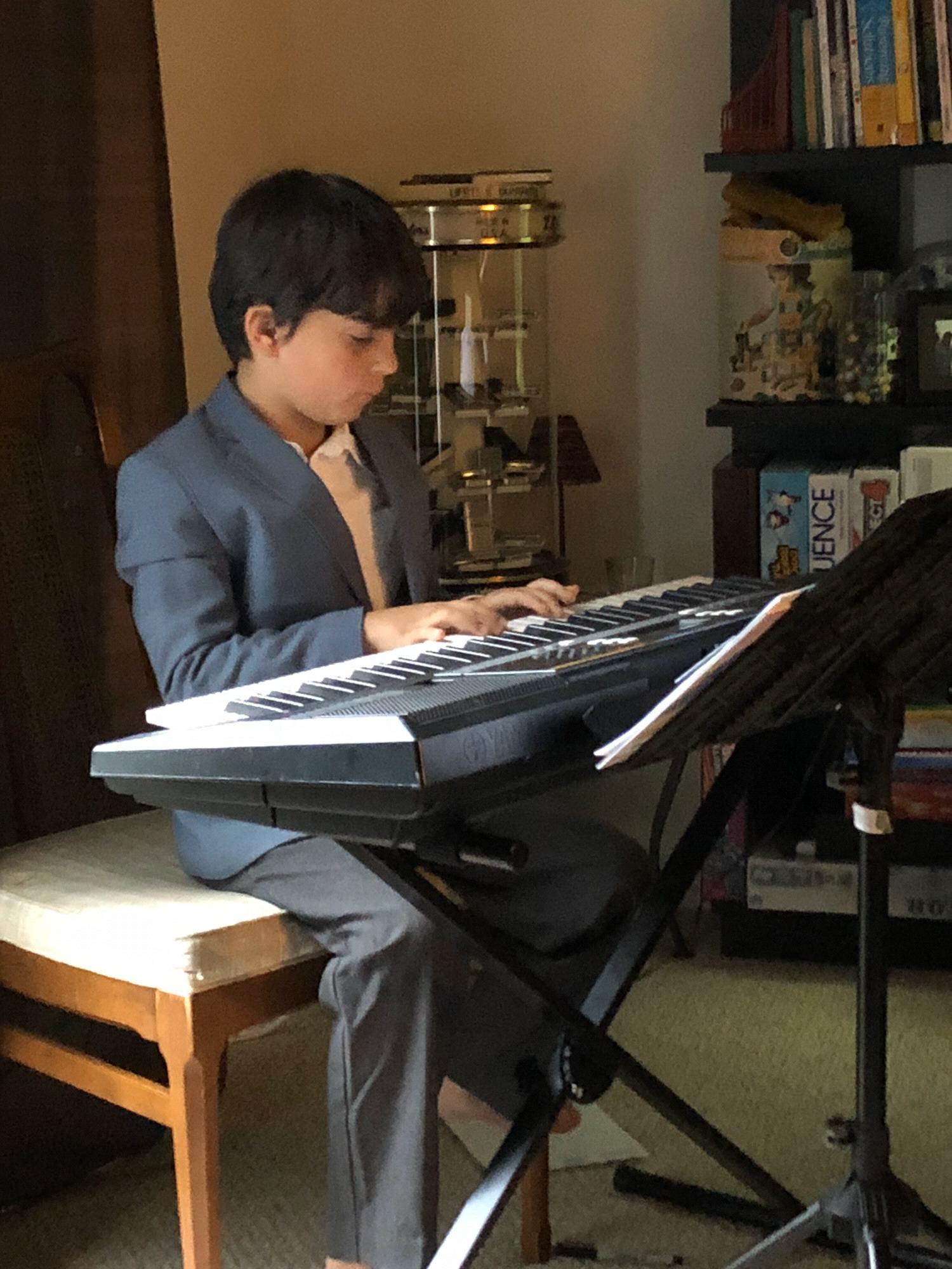 Jayden loves to play Piano