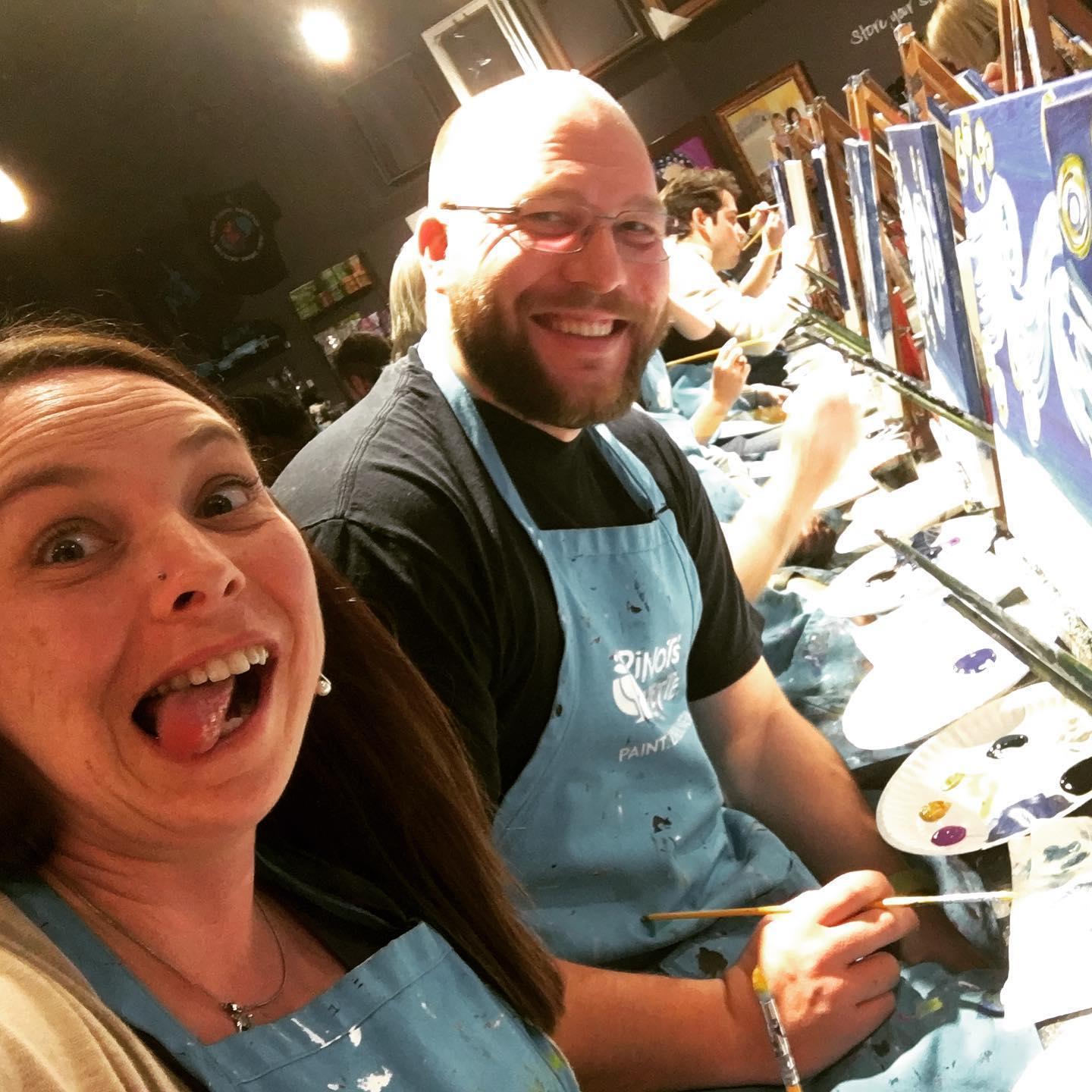 A fun date night at Pinot's Pallet painting matching Kansas City Starry Night skylines.