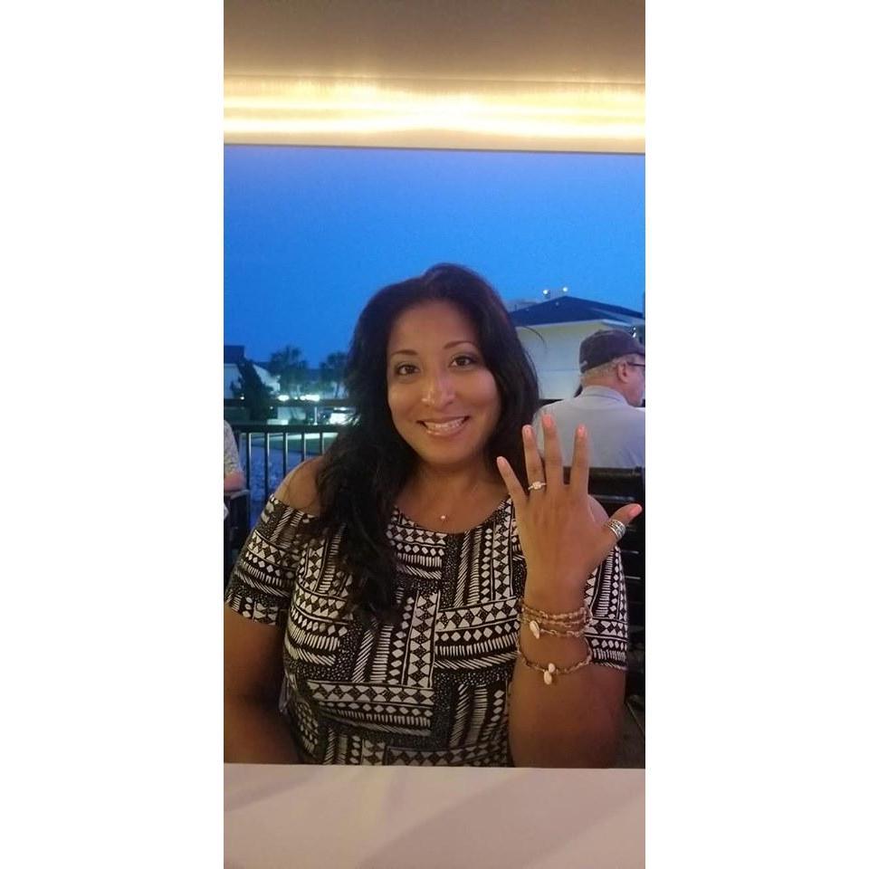 The NEWLY engaged Woman.  ;)