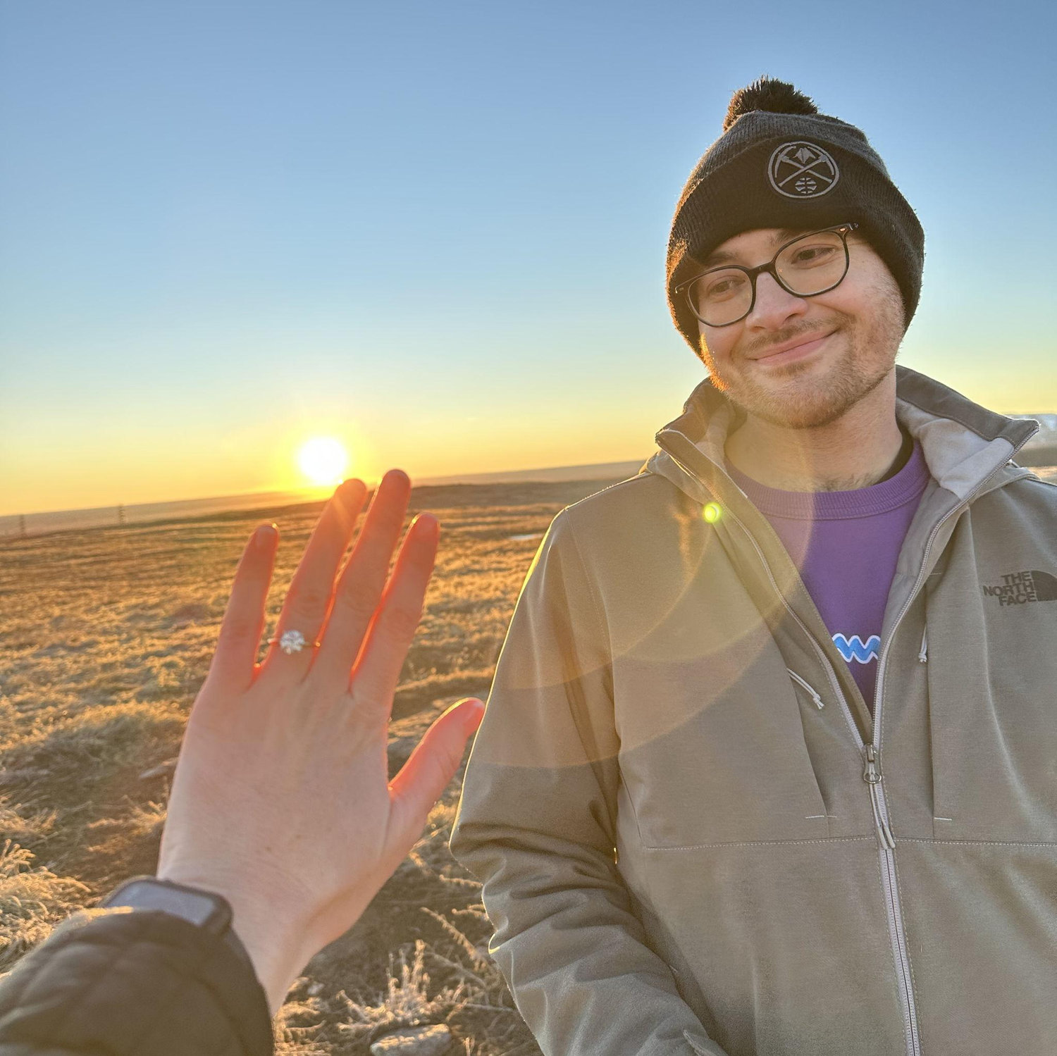 "The sunrise over the rest of our lives." This picture was taken right after Darby said YES to Matt's proposal in December 2024 on North Table Mountain.