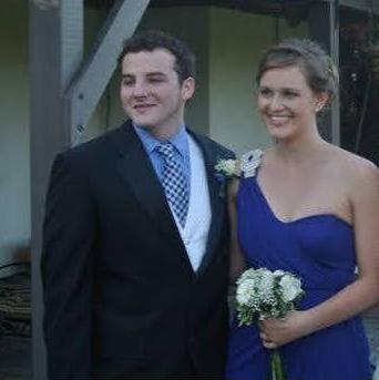 Travis decided to be edgy by bringing Kate a bouquet instead of corsage. She had to carry it around all night.