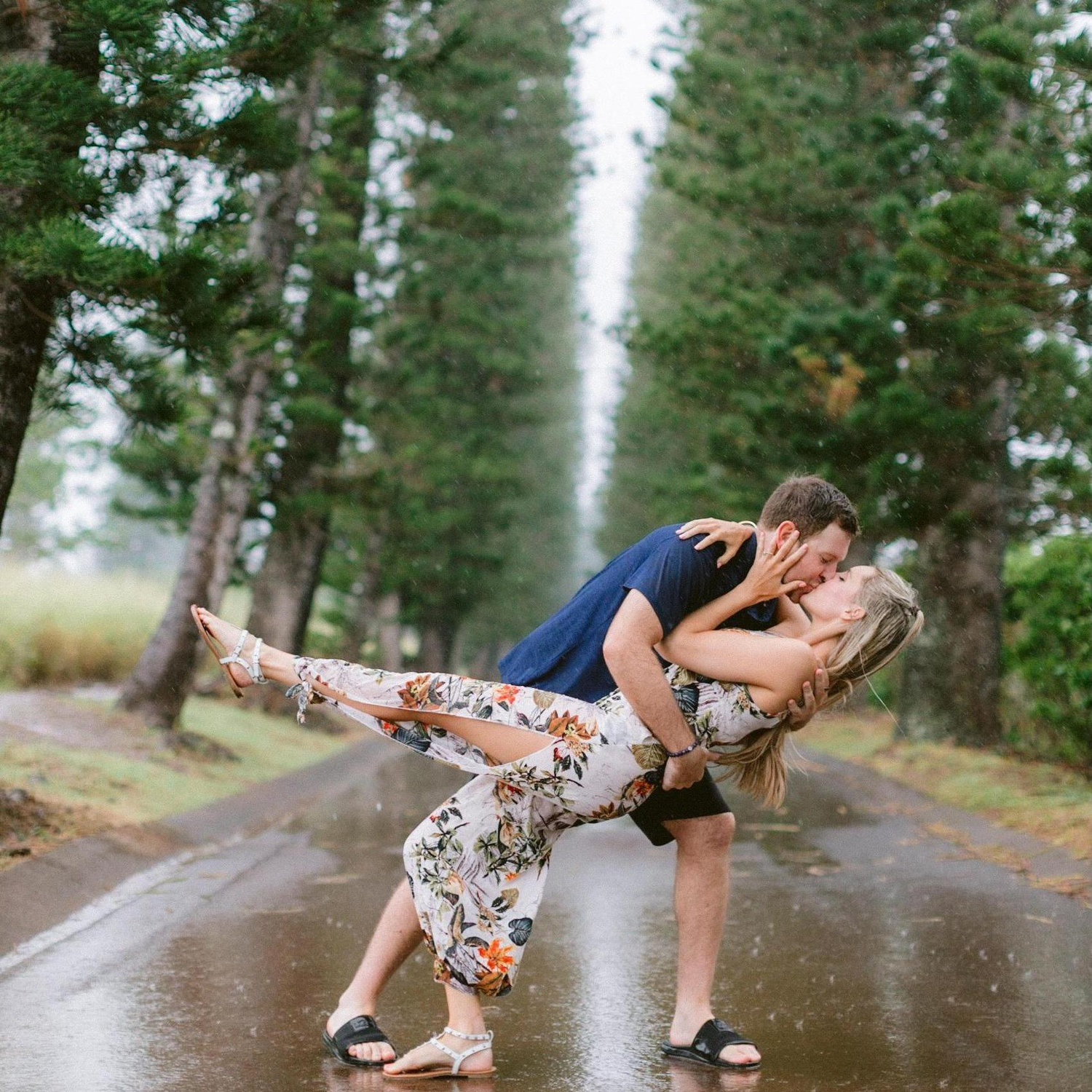 Kissing in the rain on on our engagement day 12.26.2020