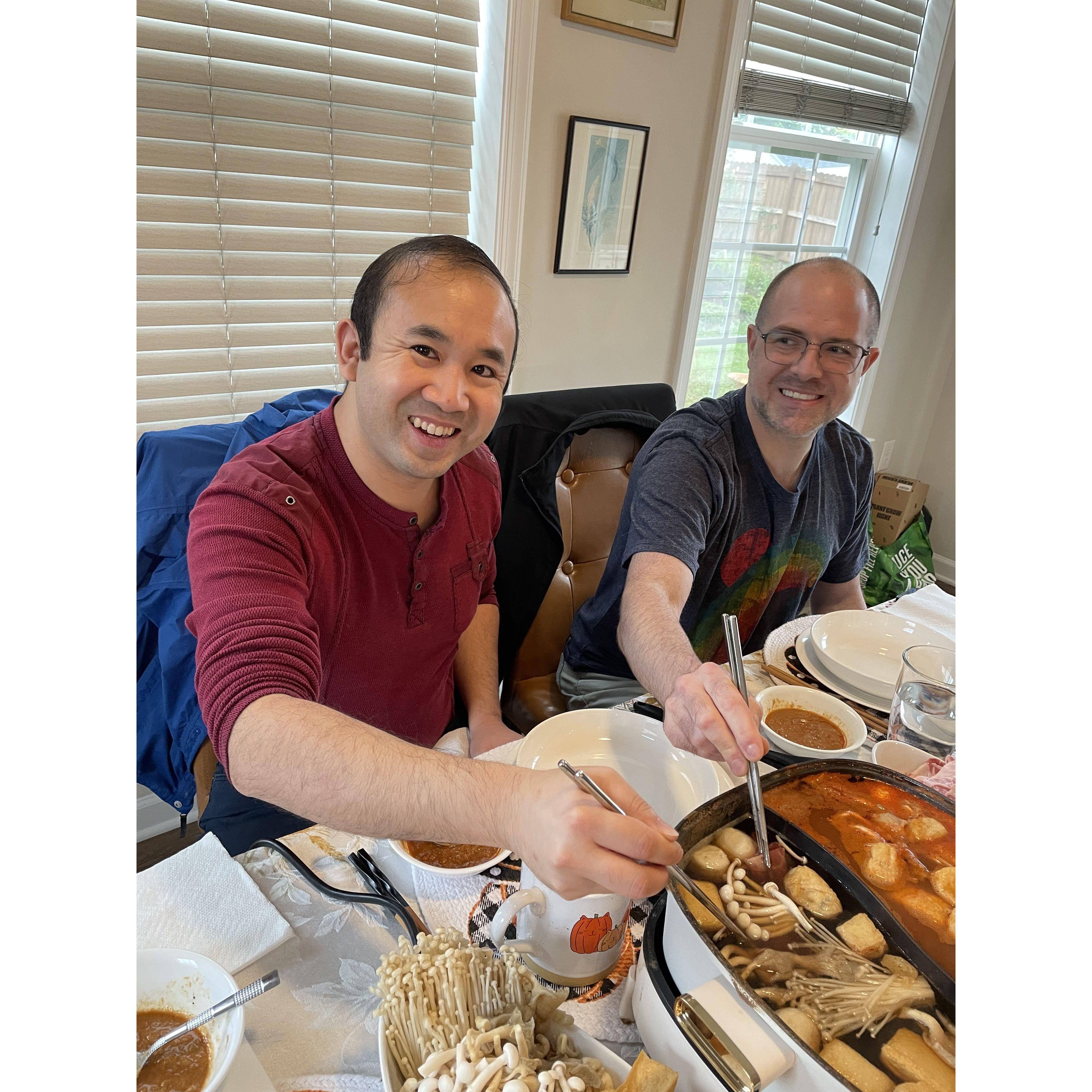 Derek and Joshua introducing Aaron and Liza to hot pot at their home