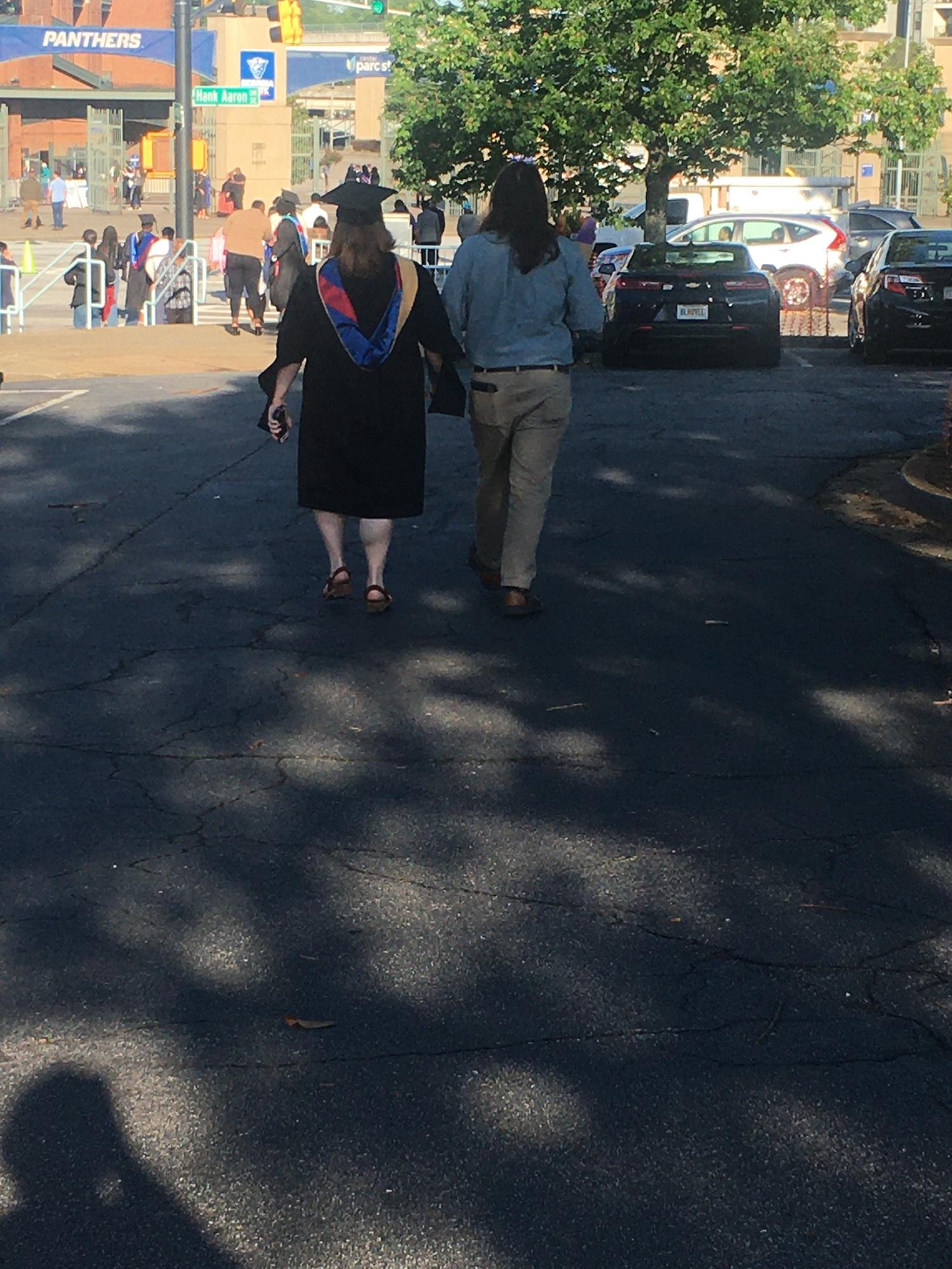 Walking in to Cori’s MSW graduation ceremony.