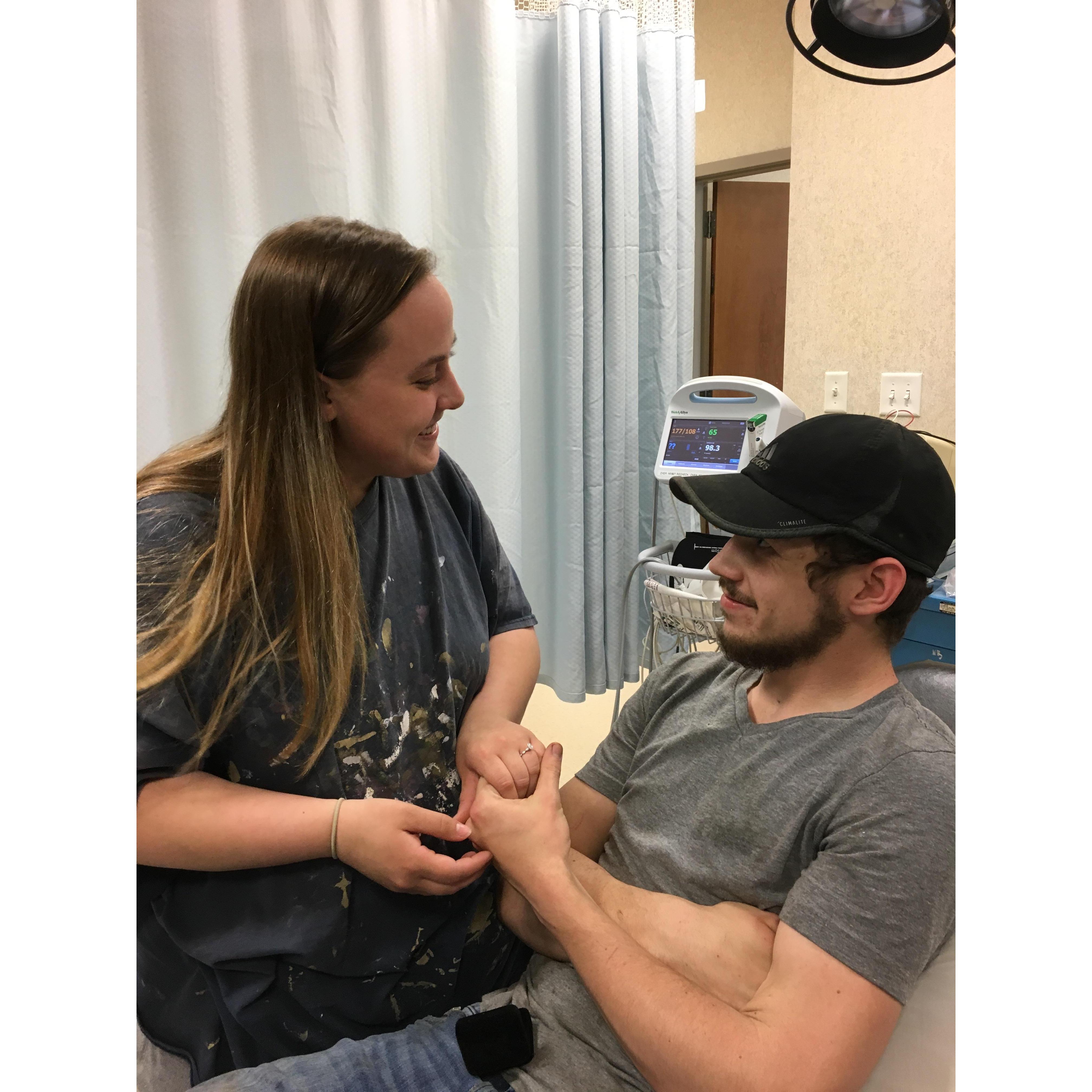 William had carved a tree to propose but the day he was going to do it he cut his foot and ended up in the urgent care for stitches and decided to propose here to make it memorable.
