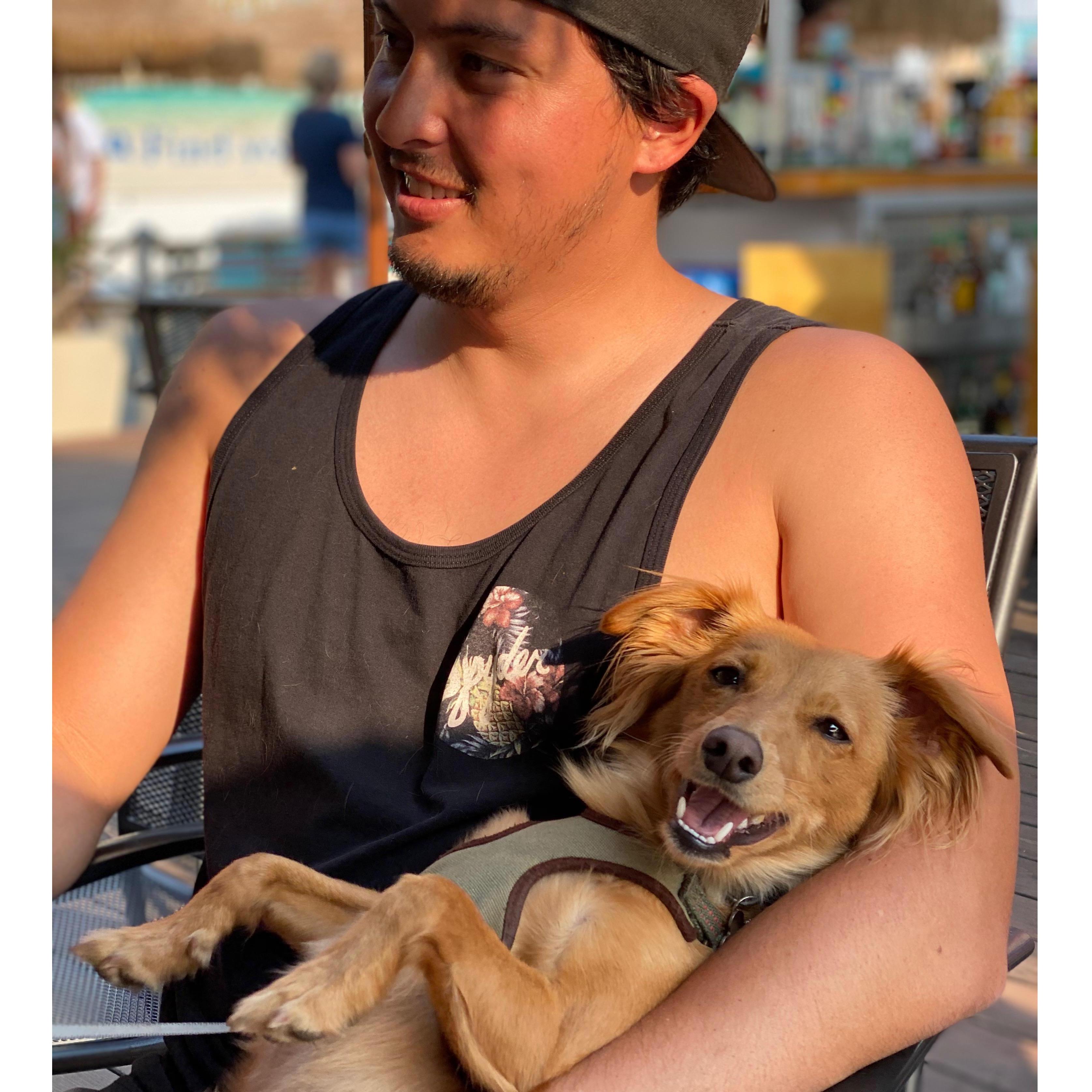Benji chillin with dad, after a long day on the lake
