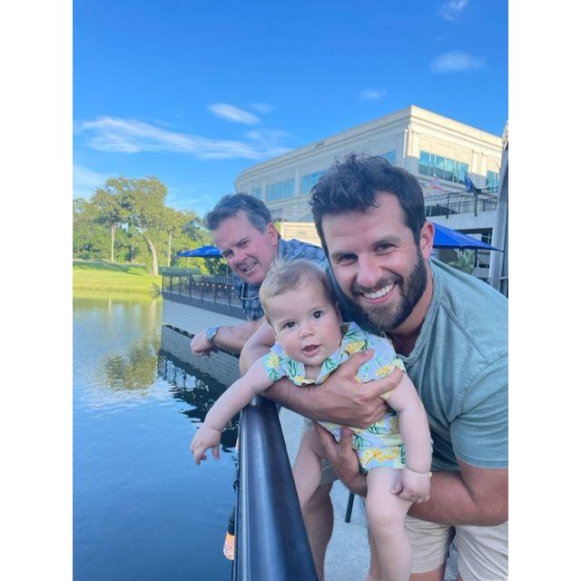 Jack checking out the alligators with Uncle Kyle and Papa