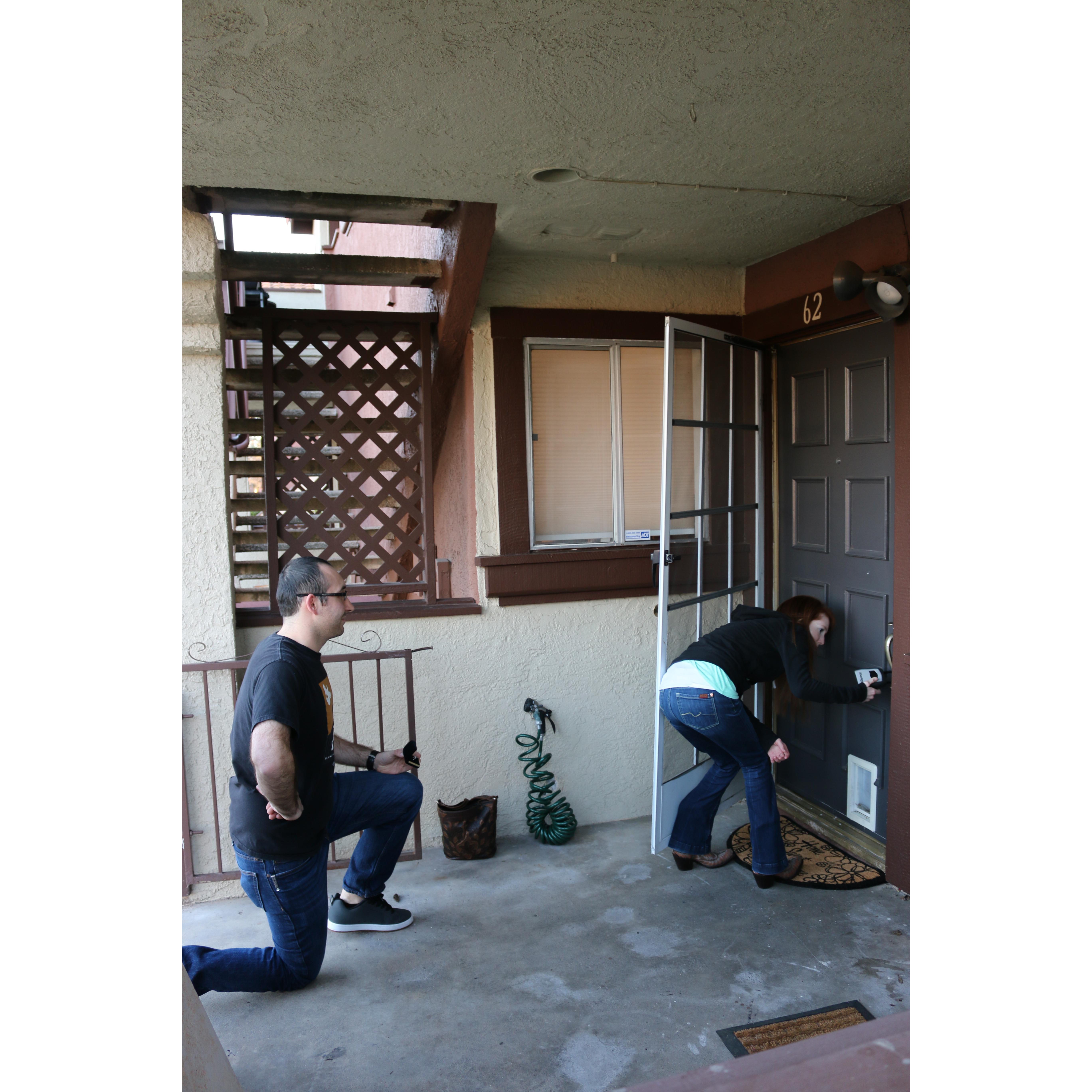 Trying to to open the door to our first home together.