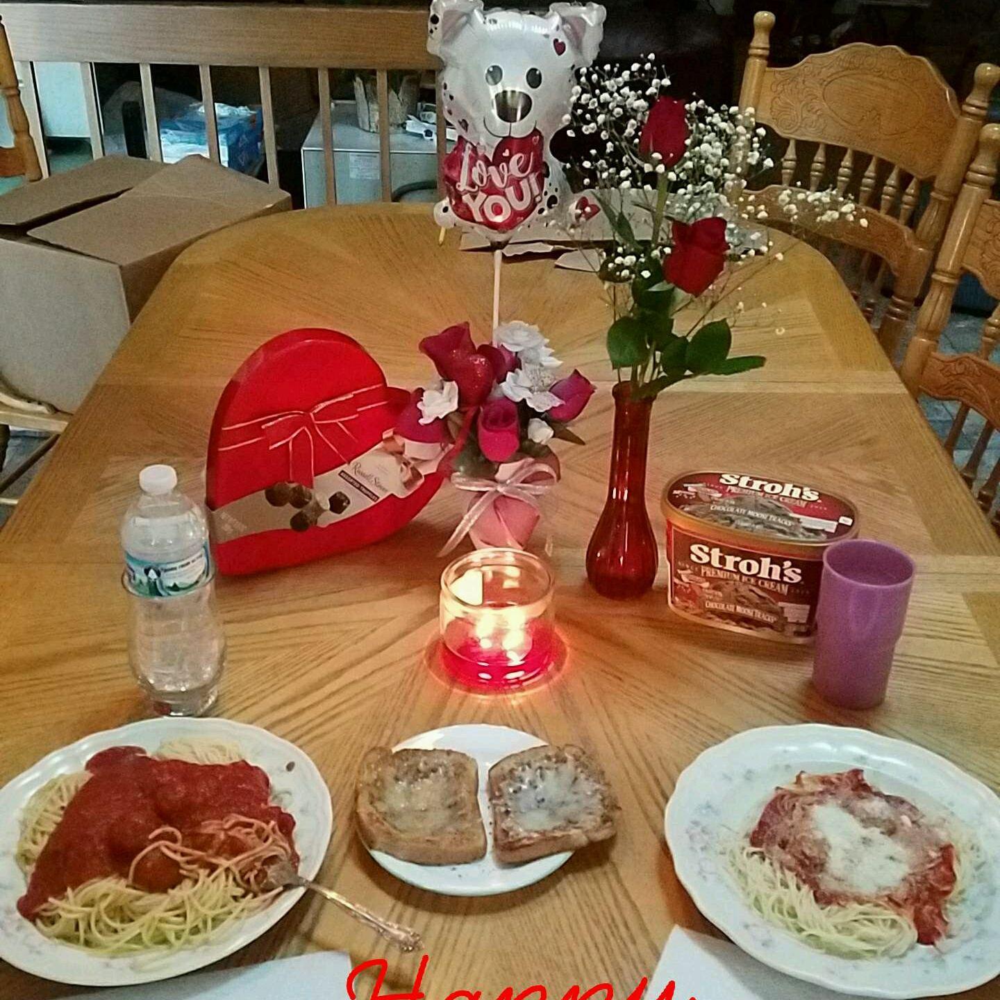 Valentines with chocolate, ice cream, flowers, and a balloon 