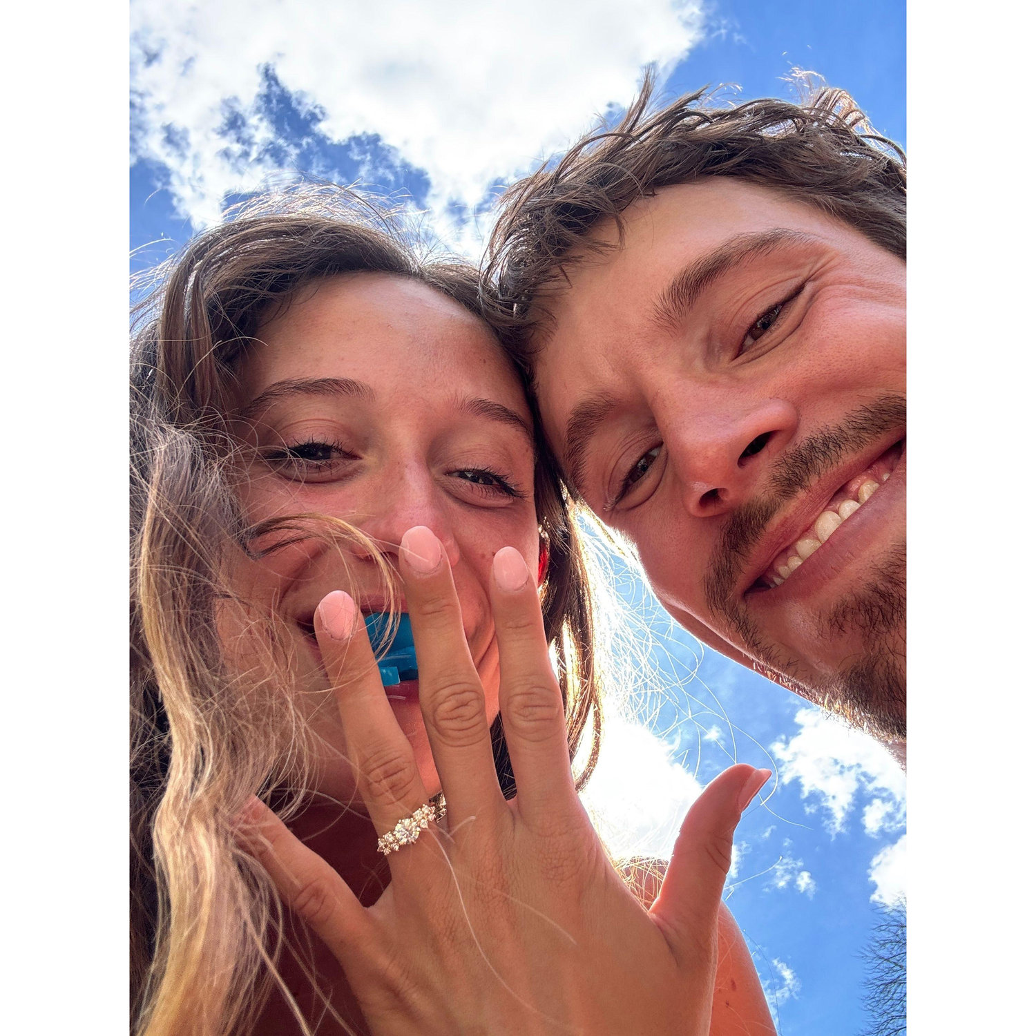 Before the proposal, Keegan turned finding Ring Pops into our little game. I’d discover them tucked in my gas cap, hidden in my backpack, or waiting in my cars glove compartment. On August 17th, he proposed on a paddle board up north, this time with a real ring. We then went on the boat where he proposed a second time with a Ring Pop, a sweet reminder of how it all began.