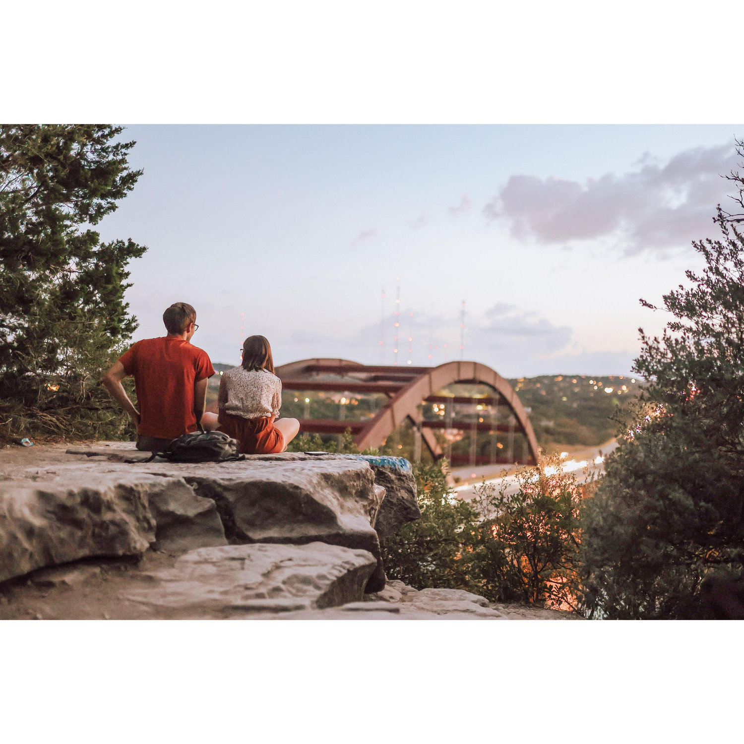 A stranger took this picture of us looking out over Austin at the 360 bridge.