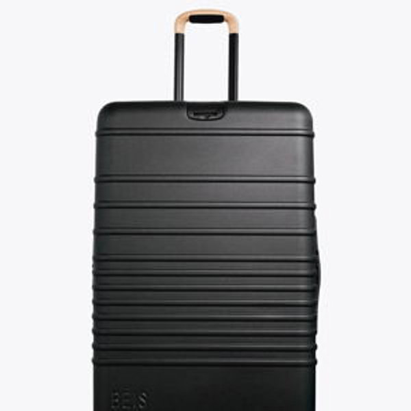 The Large Check-In Roller in Black Tan Handle