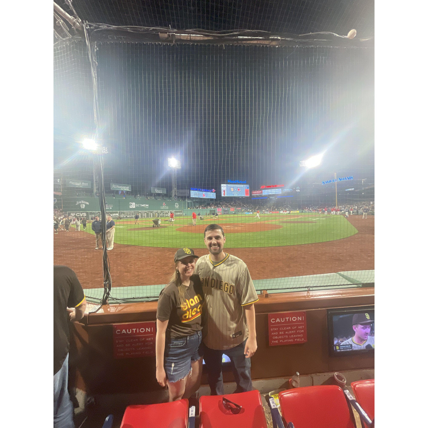 Right behind home plate at Fenway Park