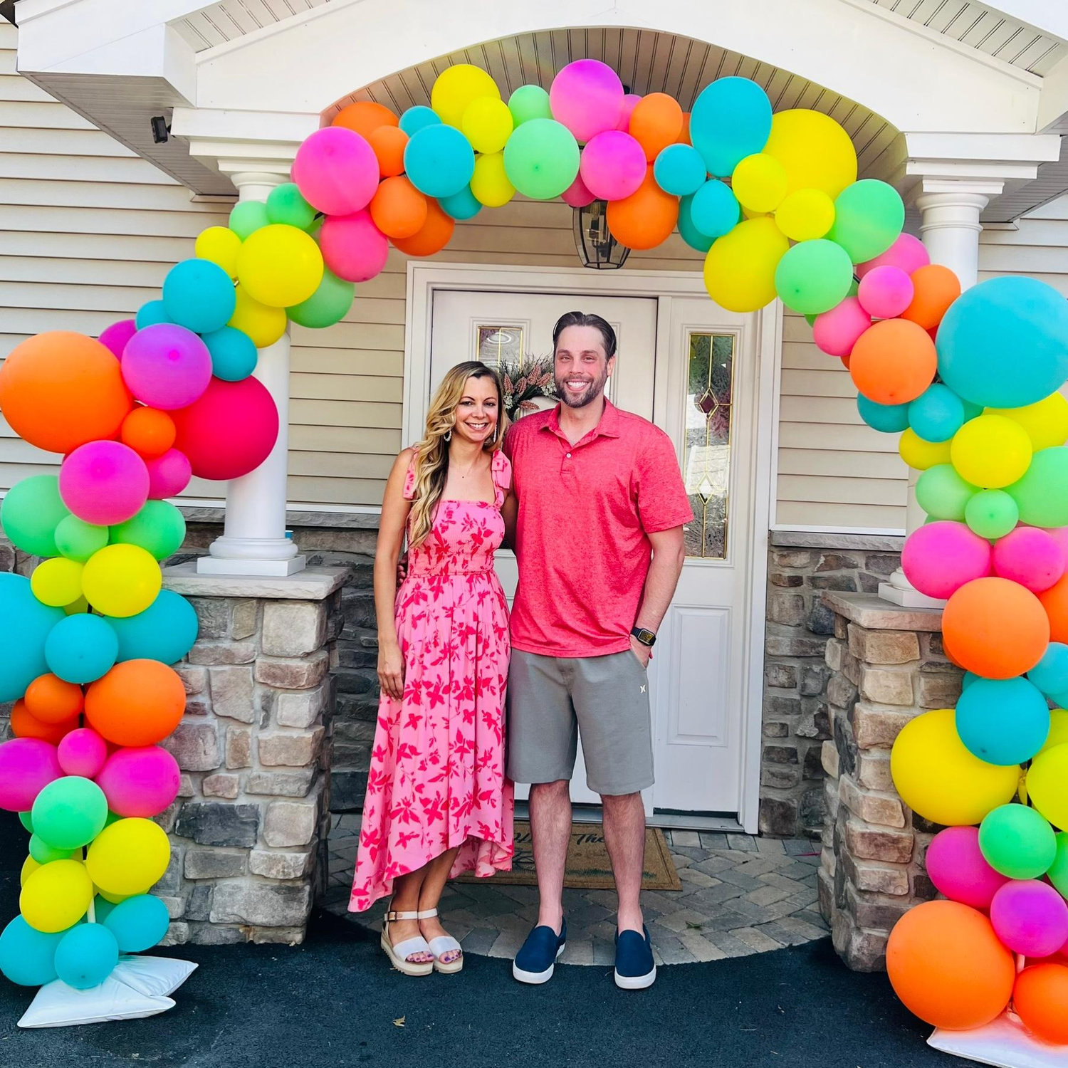 Test of true love... creating a balloon arch together.