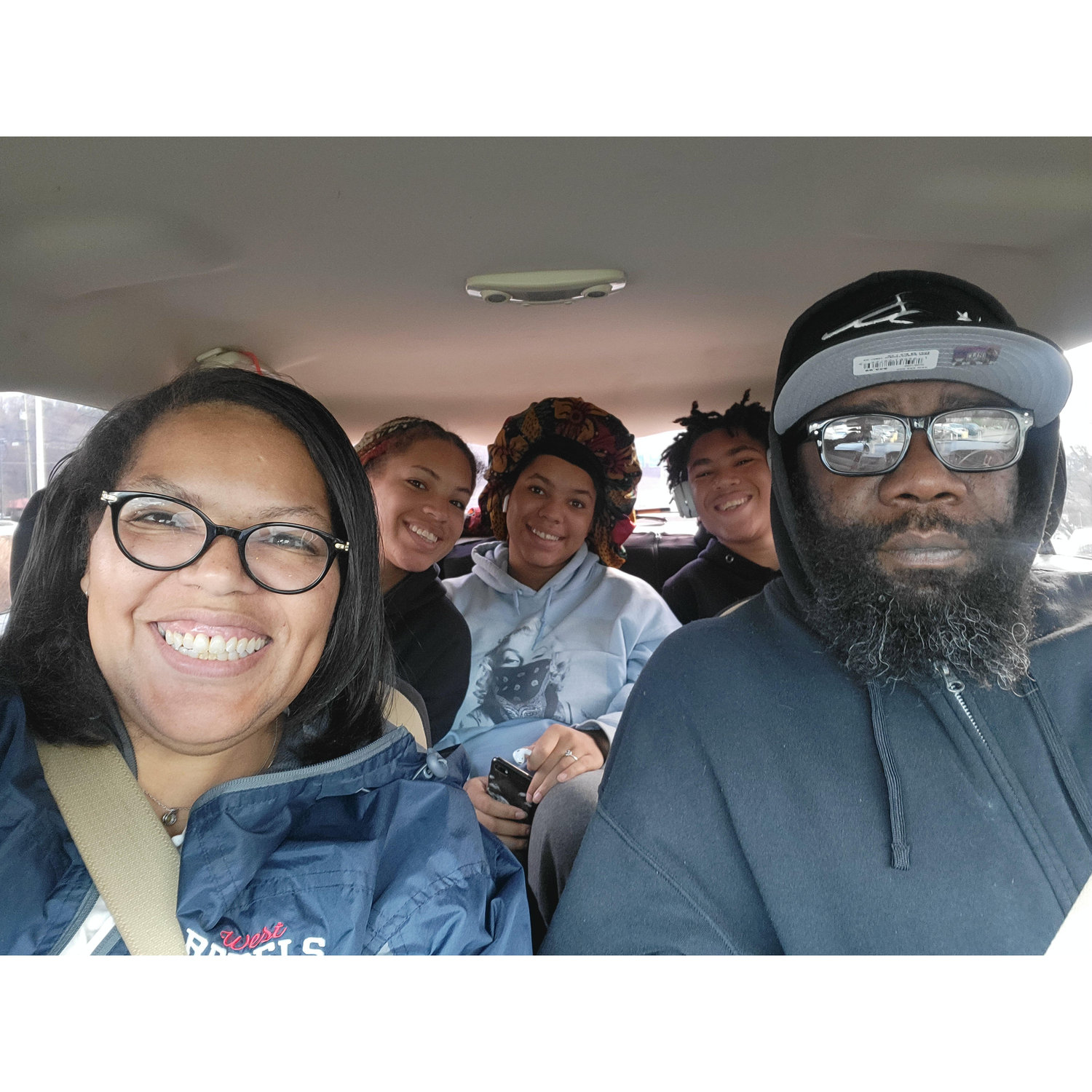 Our little family!!! On a Starbucks run!!