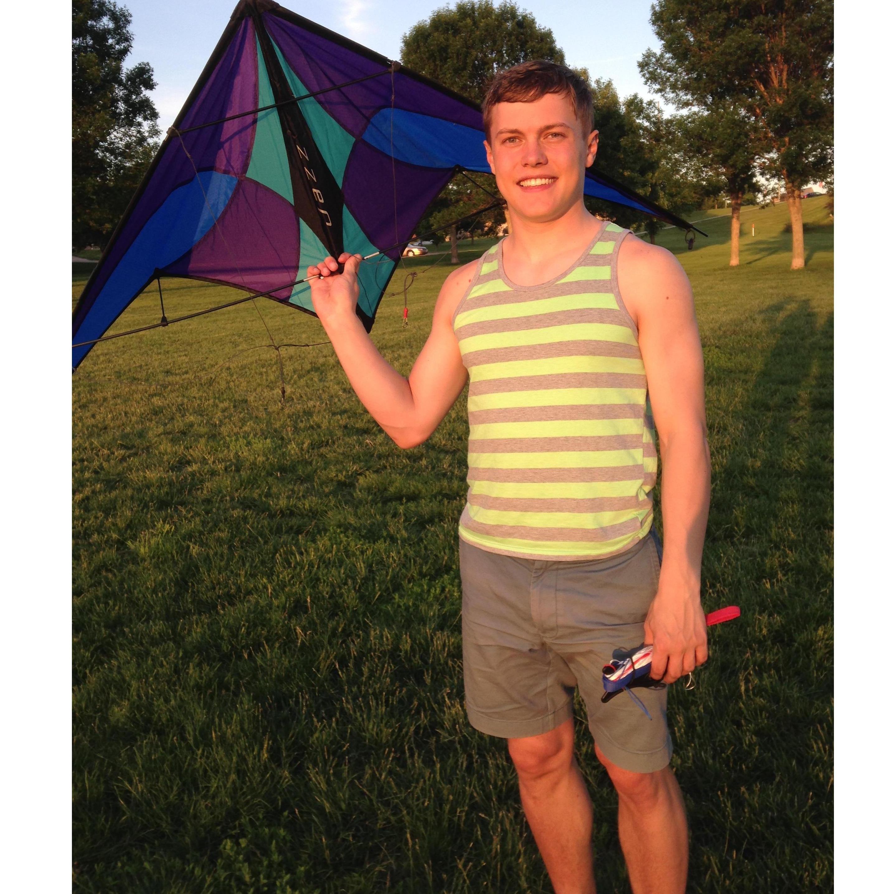 This is James and the kite he just HAD to get (and broke later that summer) hehe he's not going to like that I posted this...