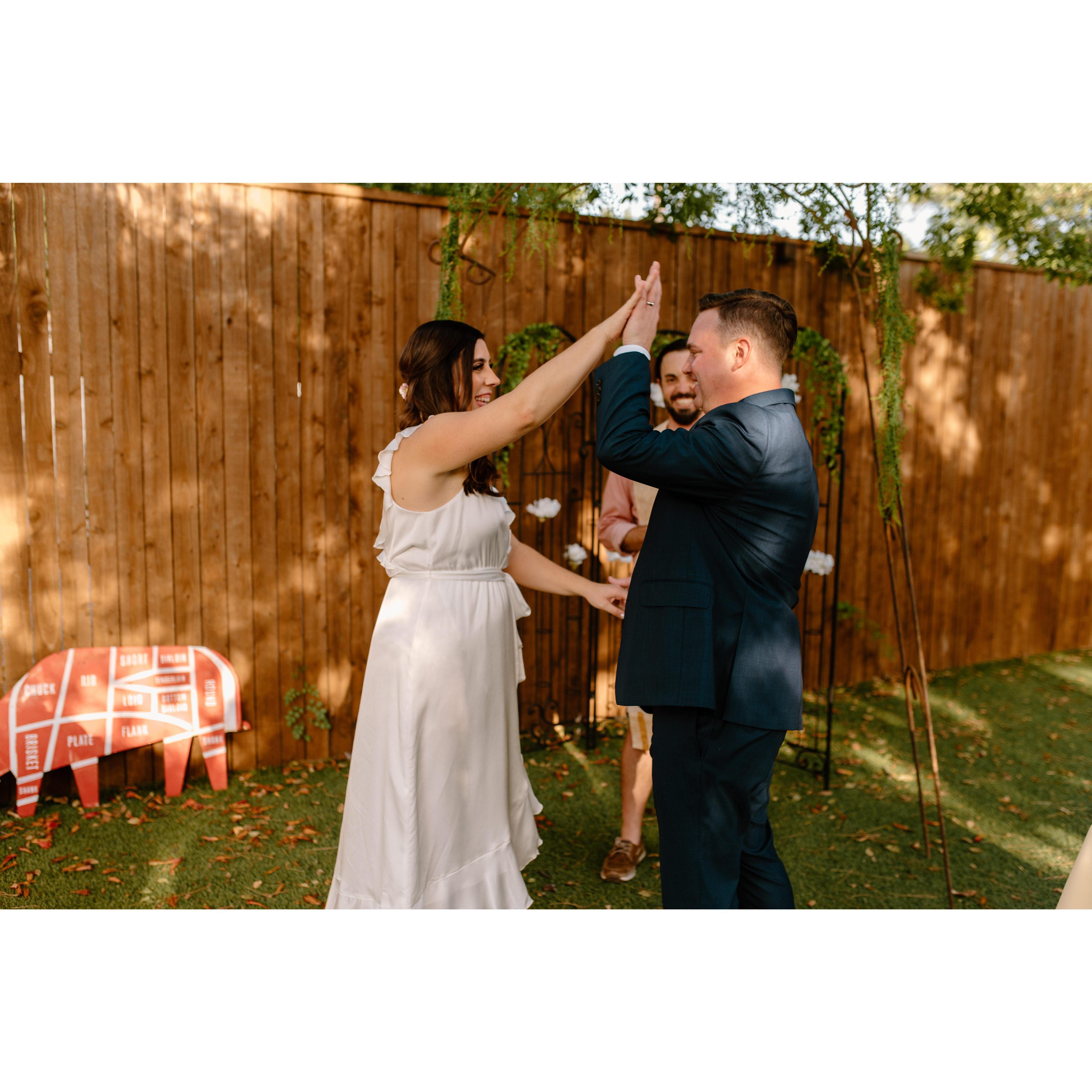 High five! We're married!