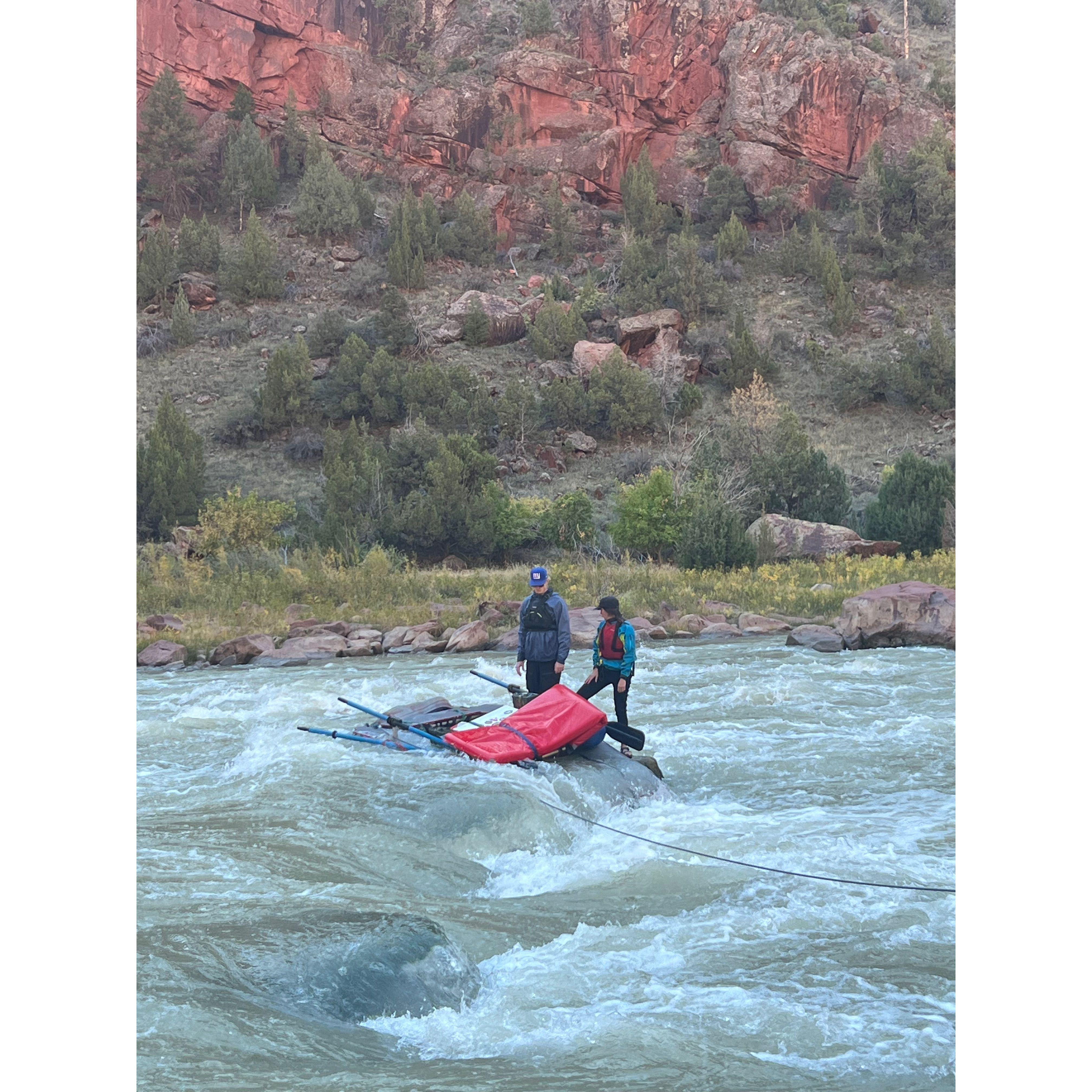 Stuck between a rock and a hard place in Hell's Half Mile on the Green River.