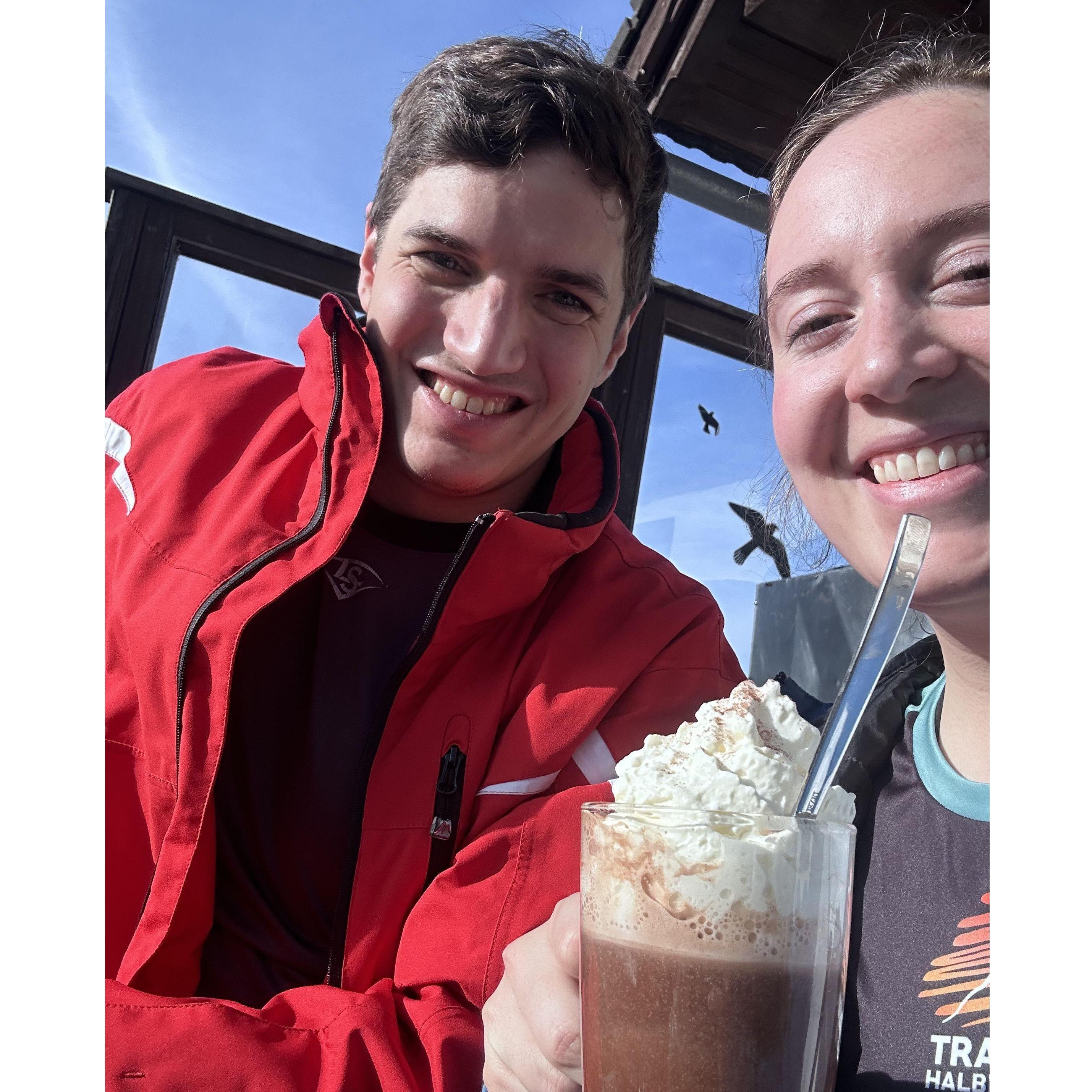 Enjoying the Austrian apres ski culture with a hot chocolate, 2024.