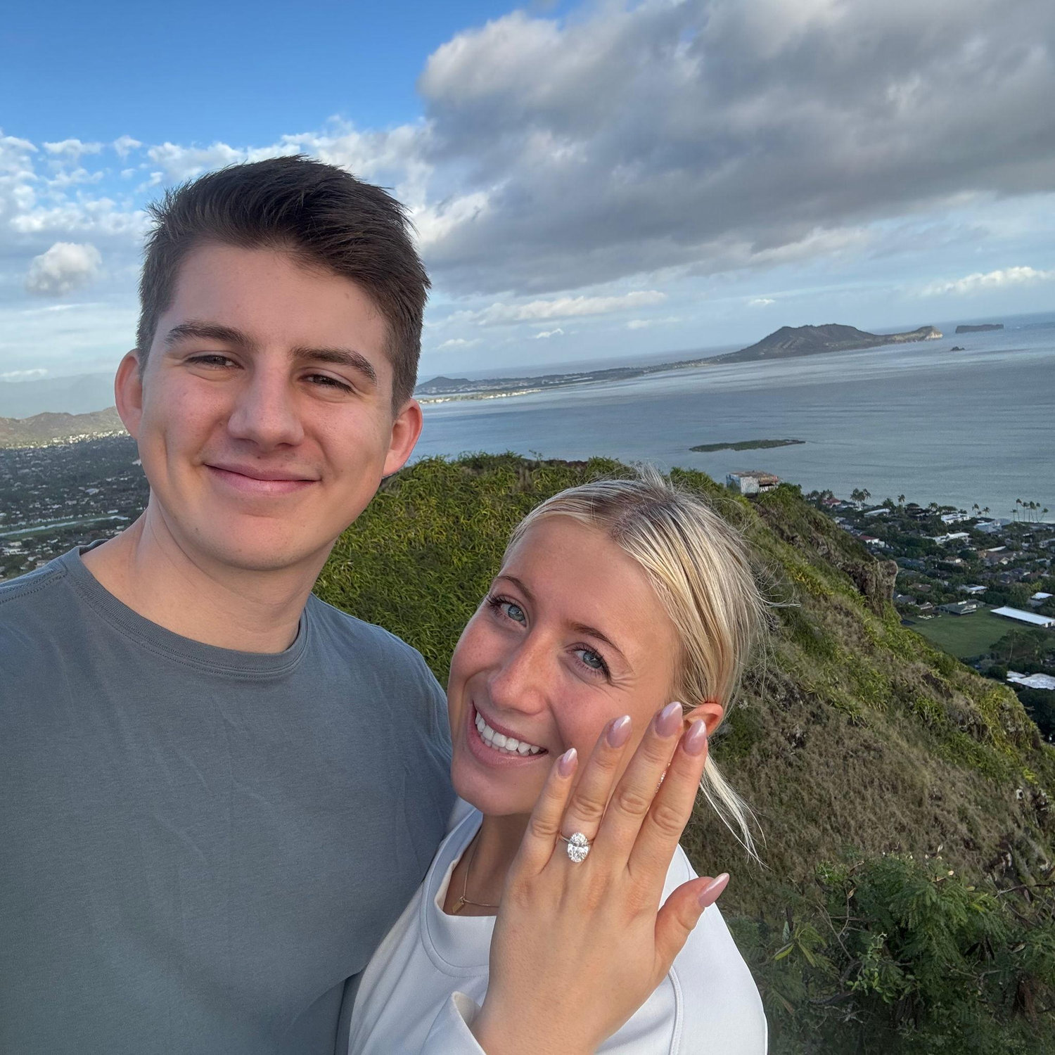 Tyler proposed at the top of the Lanikai Pillbox Trail in Hawaii - a moment we’ll never forget 🤍