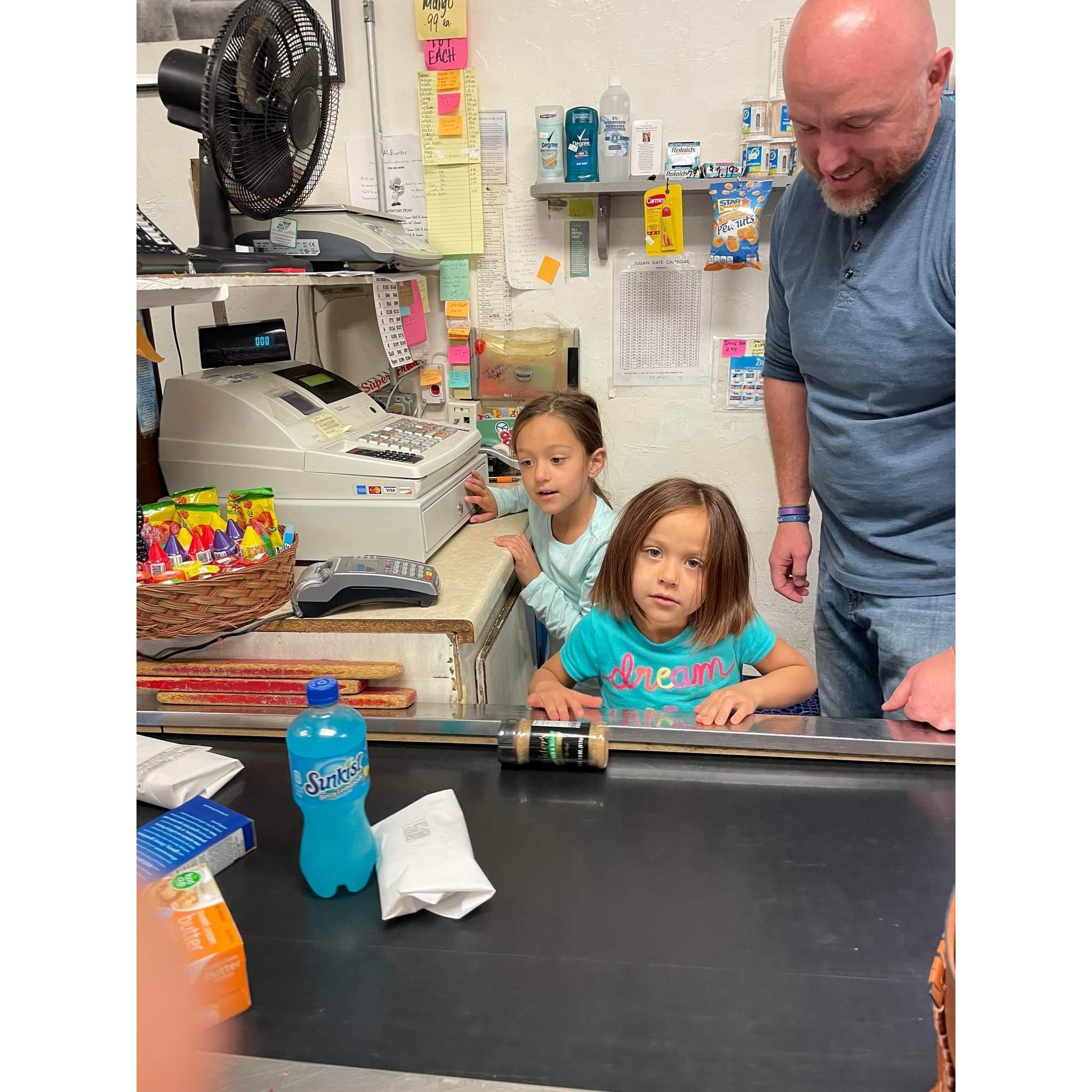 Junior cashiers in training.