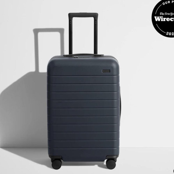 The Bigger Carry-On in Navy Blue