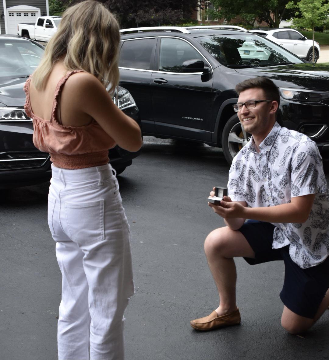 The proposal: surrounded by family and friends, at the house we spent so much of our lives growing up in.