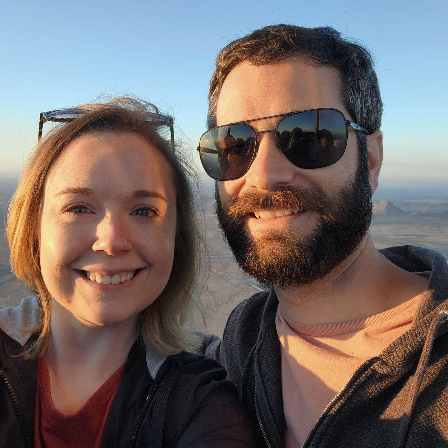 In Arizona, on a hot air balloon, watching the sun rise.