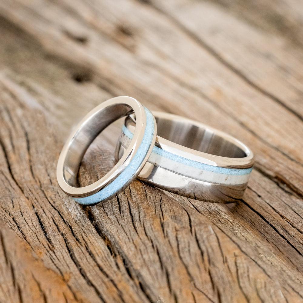 These are going to be our wedding bands. They are made of titanium metal, turquoise stone, & deer antler.