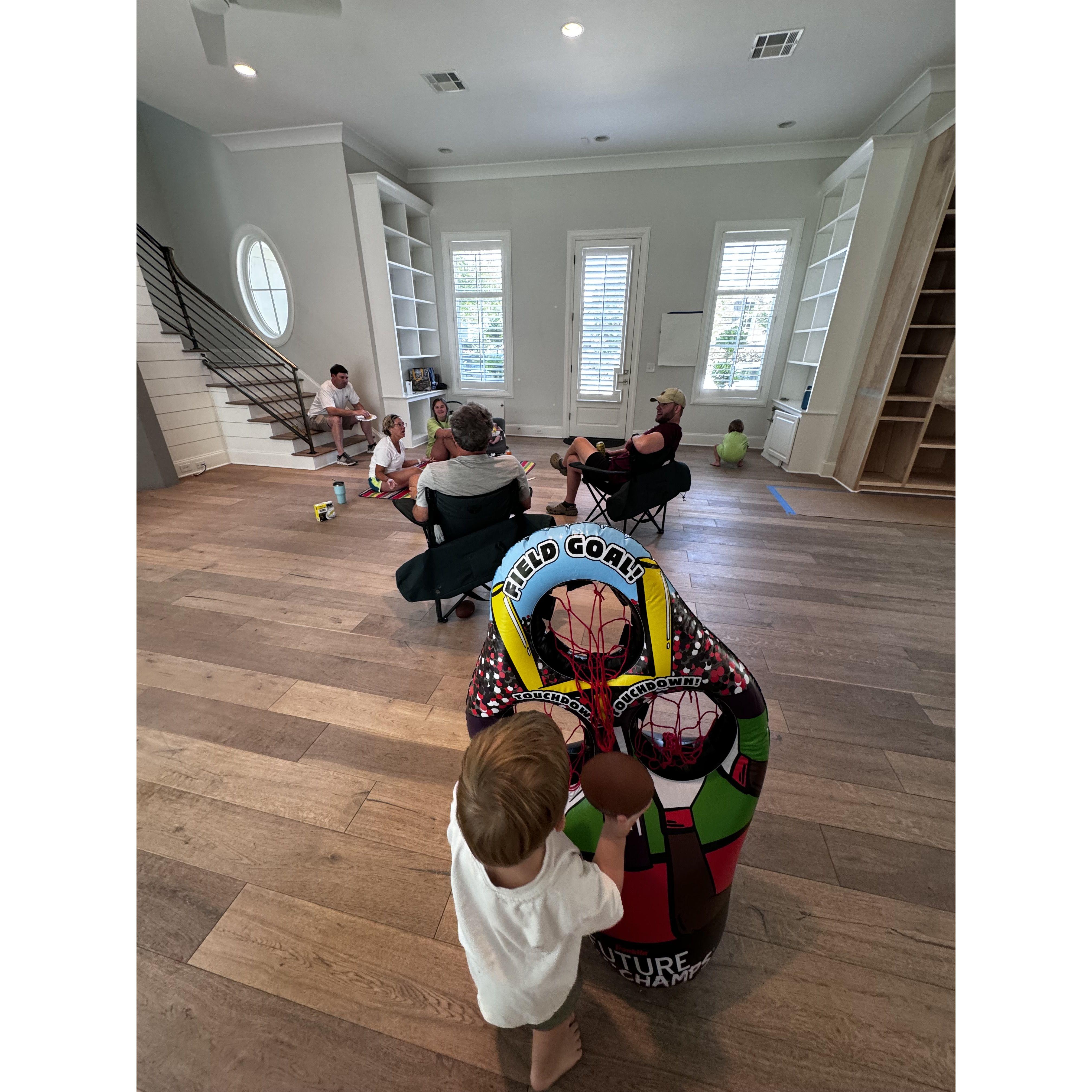 Mrs. Jan putting DeFoe to work painting and the first time he met the Addison and Kris Miller and kids!