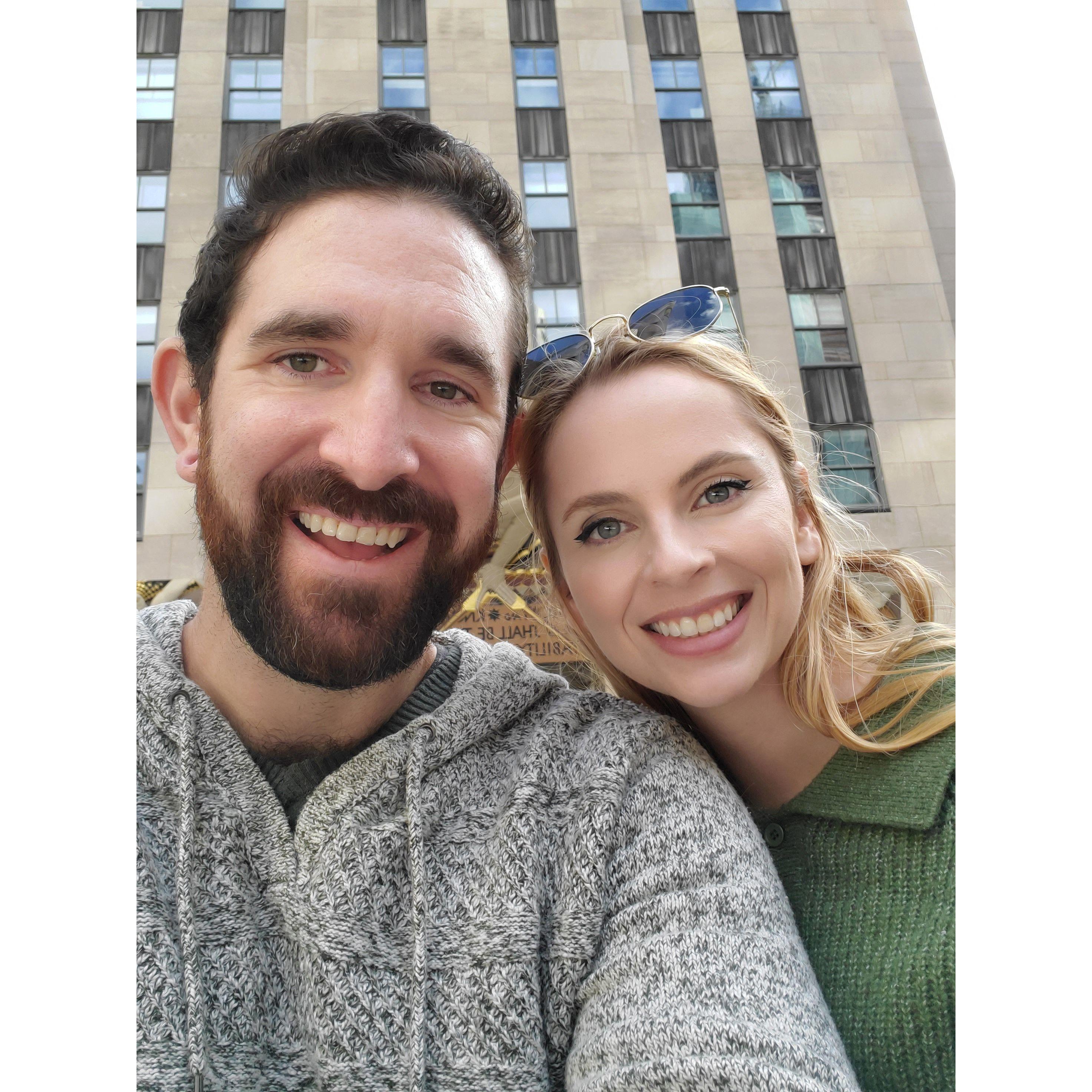 Taking photos on Wall Street NY.