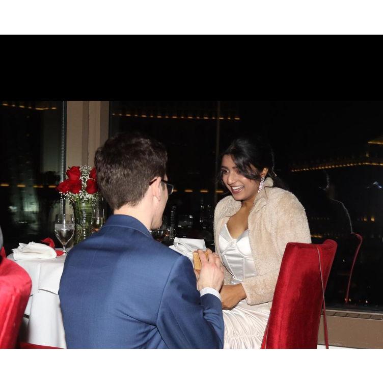 The happiest moment of our lives! It was the most romantic moment, with the Bellagio fountain in the background and cheers from around the room <3