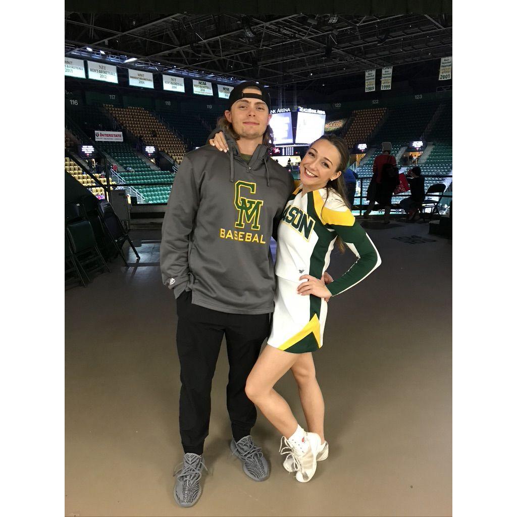 Student athletes - one on duty the other attending the game!