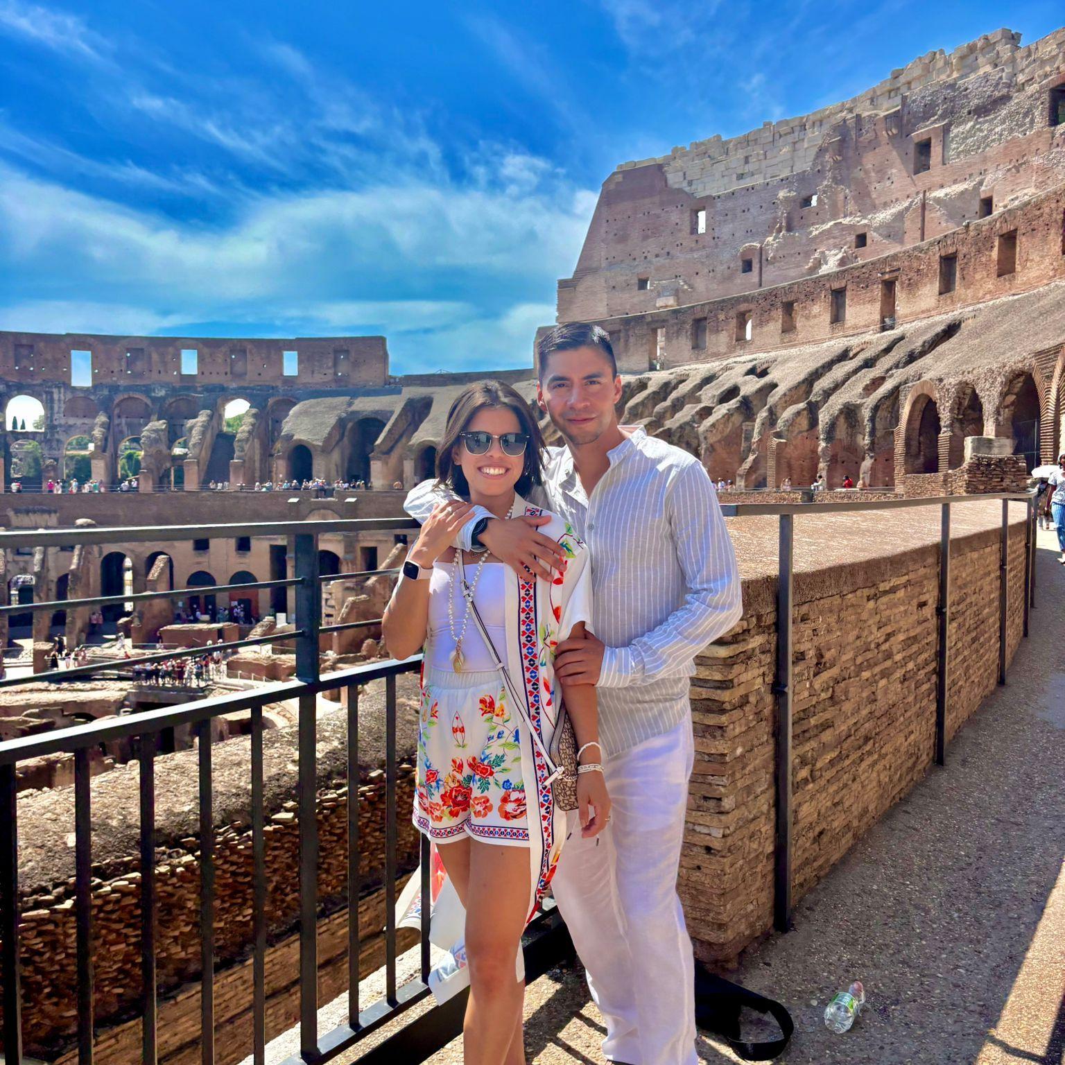 Checking out the colosseum with the outfits she picked out