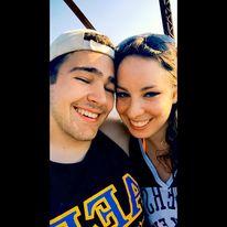 Our first facebook official photo. Also Michelle tried to make up to John for not being excited about a cool bridge he wanted to show her. oops!