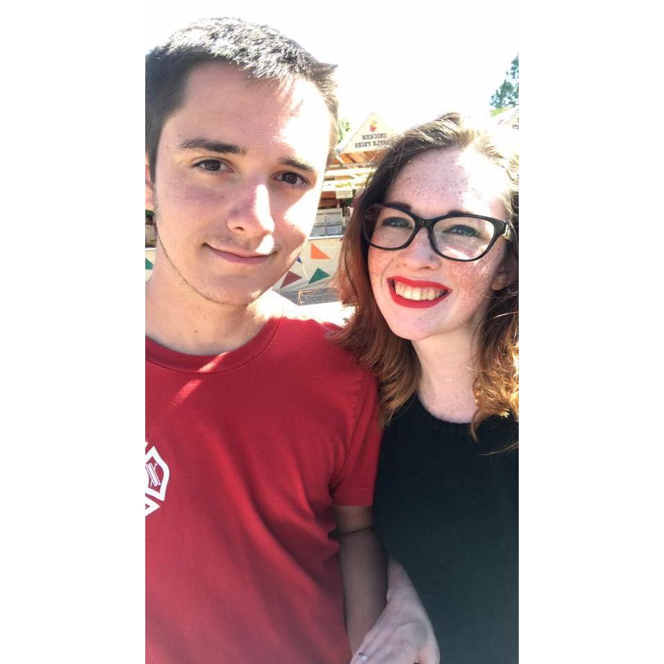 If you look closely you can see how I grabbed Cam to force him to take this pic at the state fair.