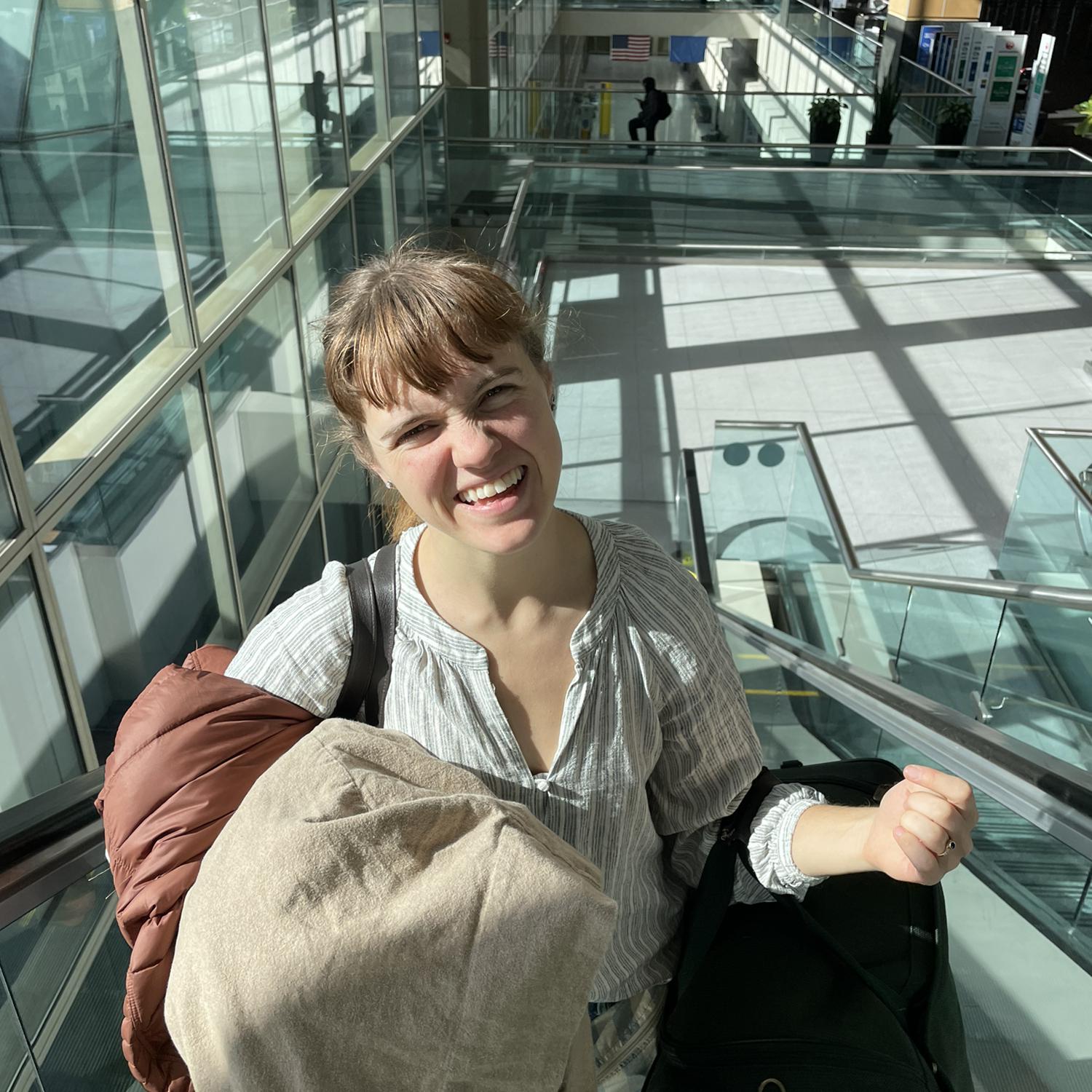 Lucille hates traveling, despite her smile.