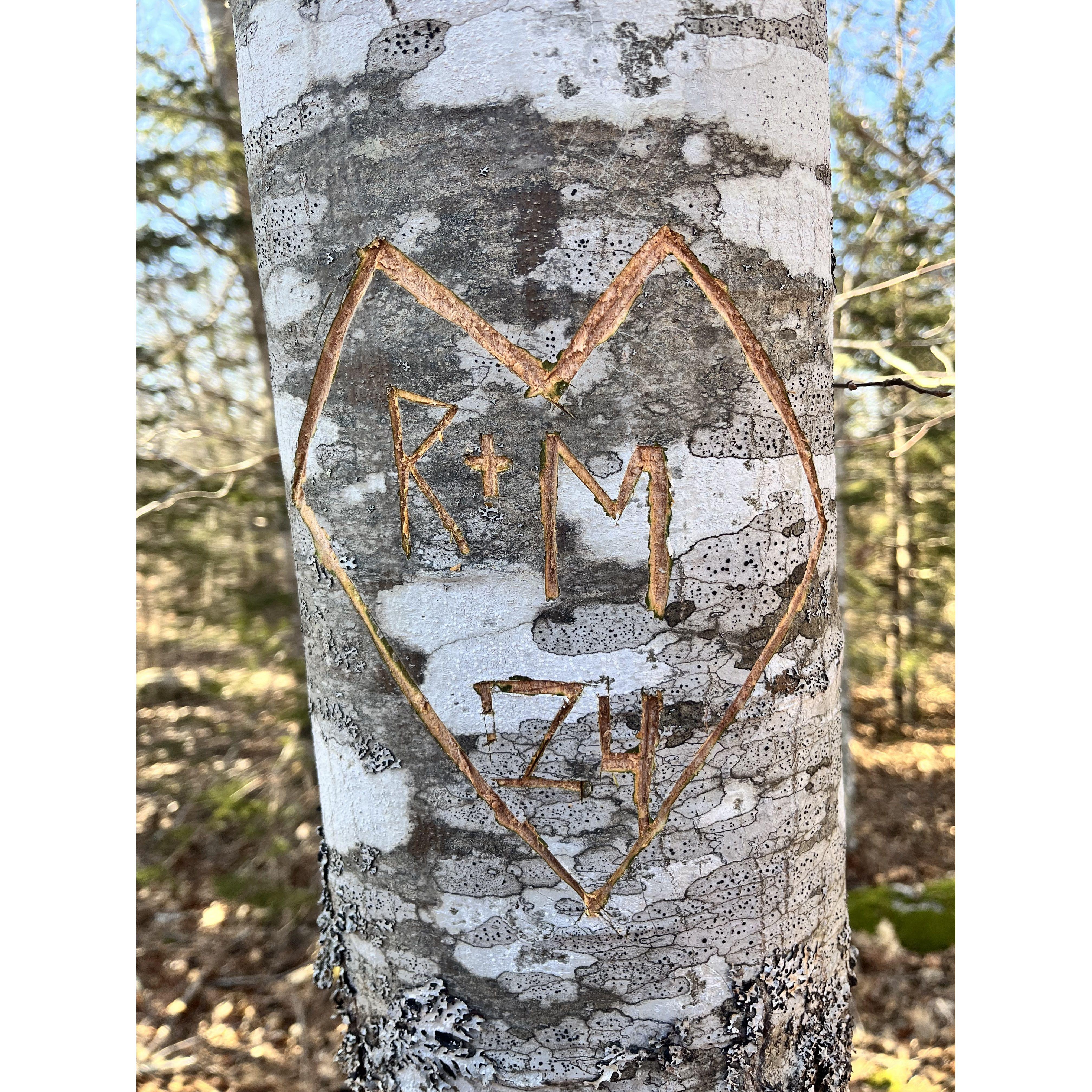 Our initials in a tree that lives on the property of out first home.