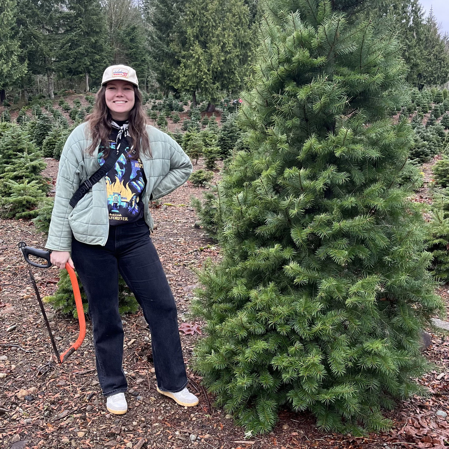 Brittney posing with our first Christmas tree!
