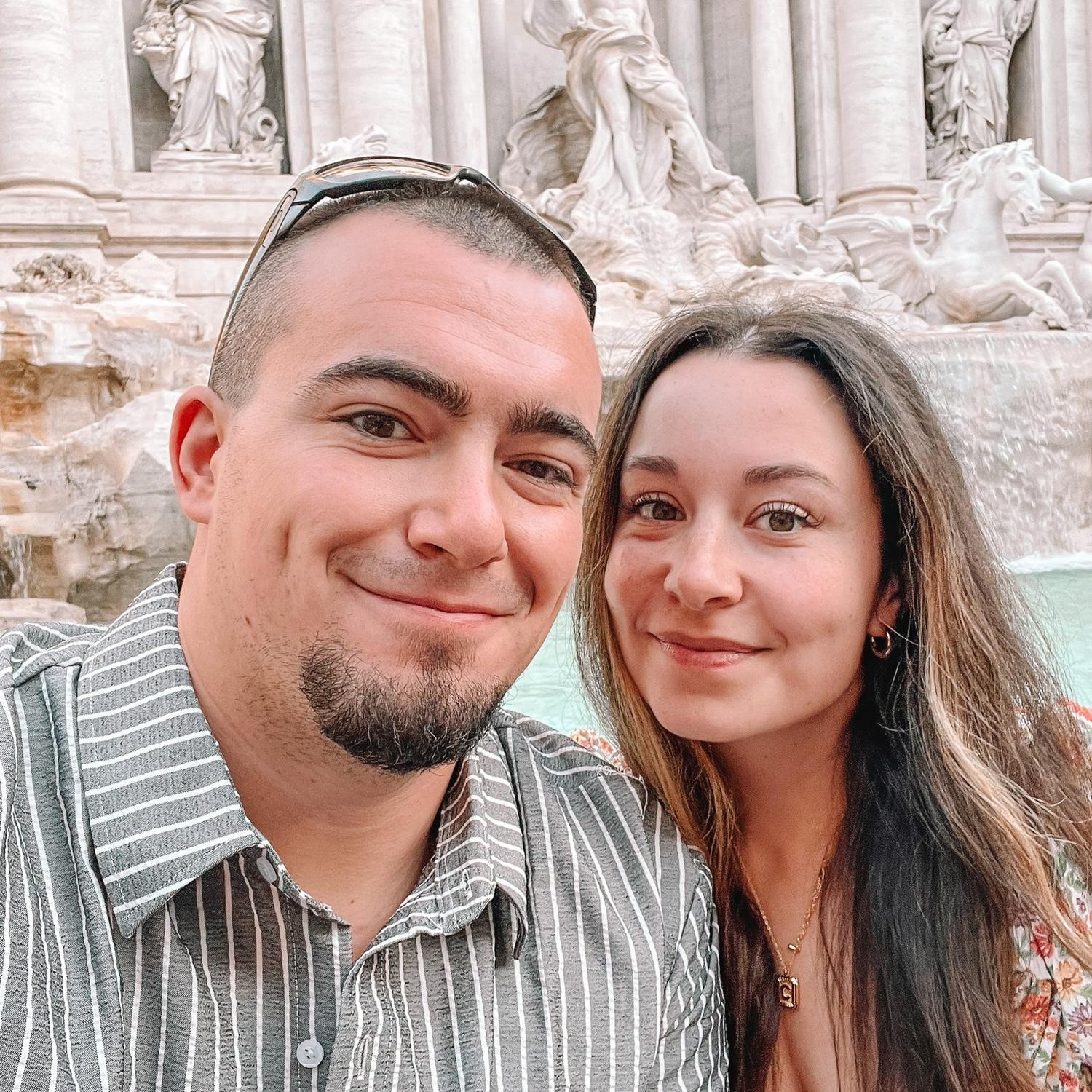 Posing in front of the Trevi Fountain in Rome, Italy, 2023