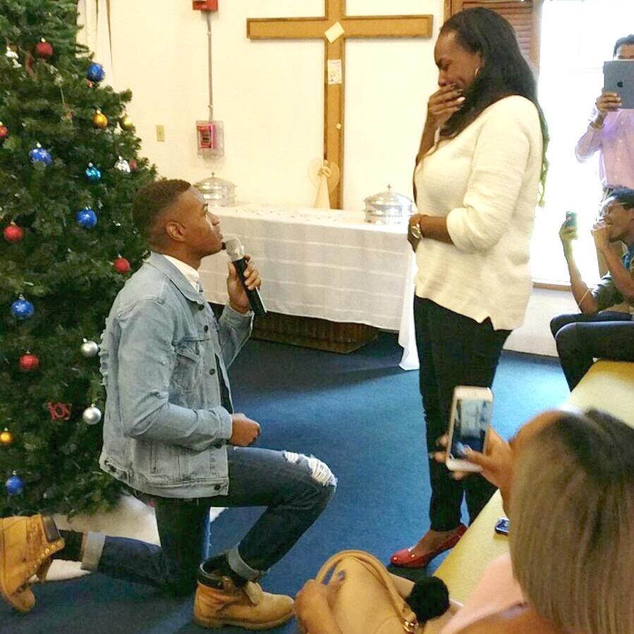 He got down on one knee.