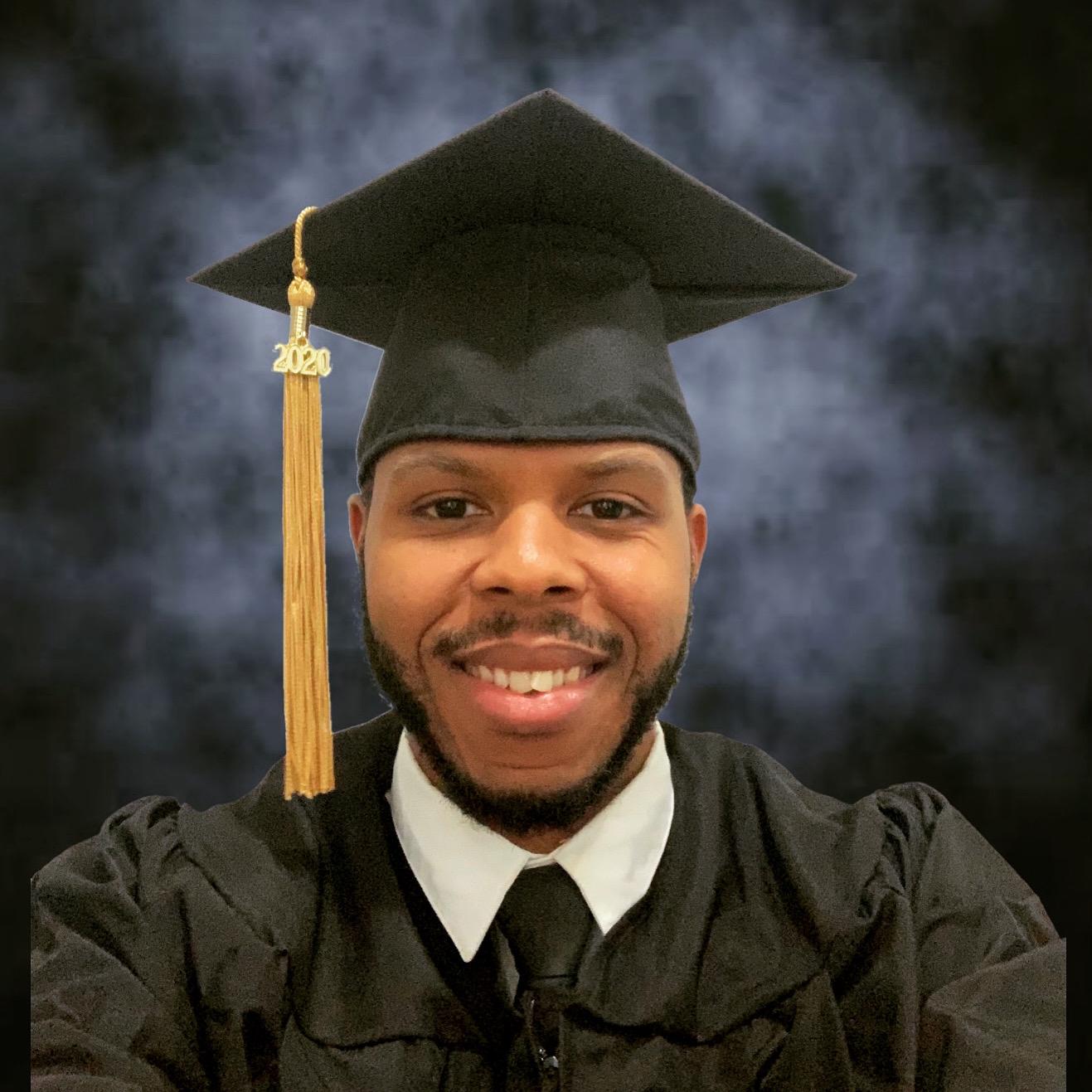 Marcus Graduating w/His Degree in Architecture & Design