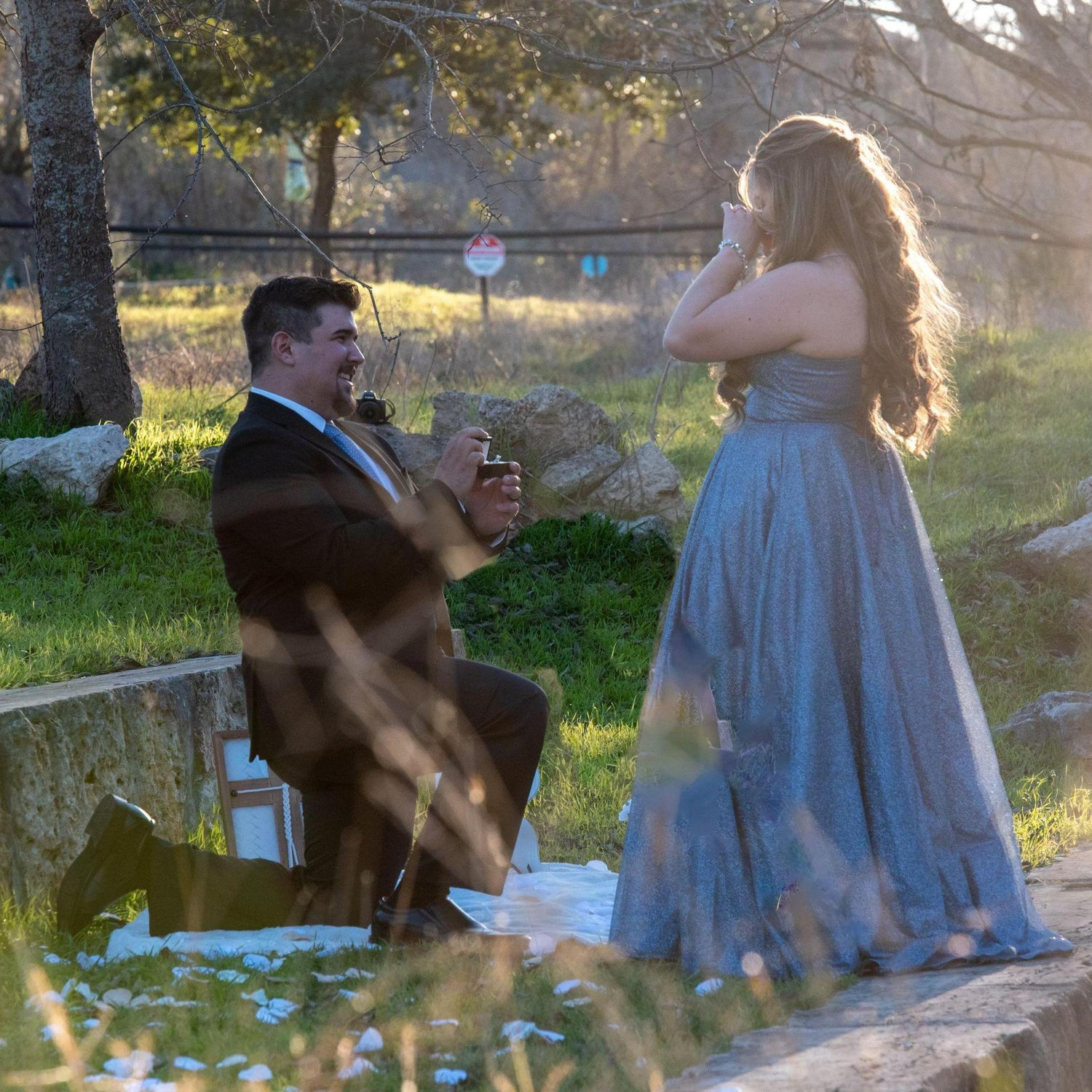 Josh took me down to our special river spot and proposed. Our photographer friend was hiding in a pile of foliage to get these pictures.